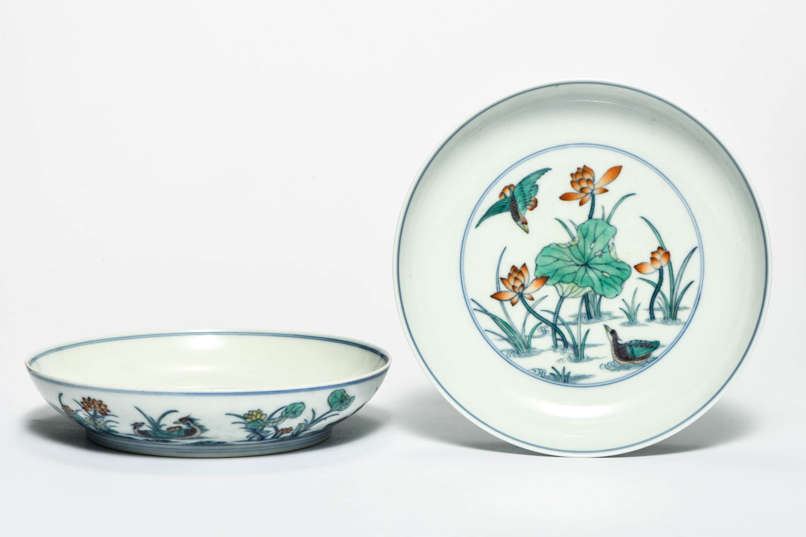A pair of doucai 'Lotus' dishes: A PAIR OF DOUCAI 'LOTUS' DISHES Description: Diameter: 18.5 cm Height: 4.5 cm