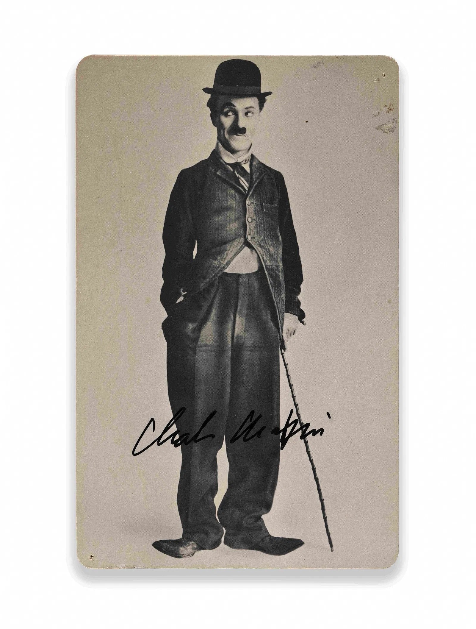 CHARLIE CHAPLIN - Signed Postcard Portrait (c. 1910s-1920s): CHARLIE CHAPLIN - SIGNED POSTCARD PORTRAIT (C. 1910S-1920S) Provenance and Authenticity: This period postcard portrait depicts Charlie Chaplin in his iconic tramp attire, a format widely circulated