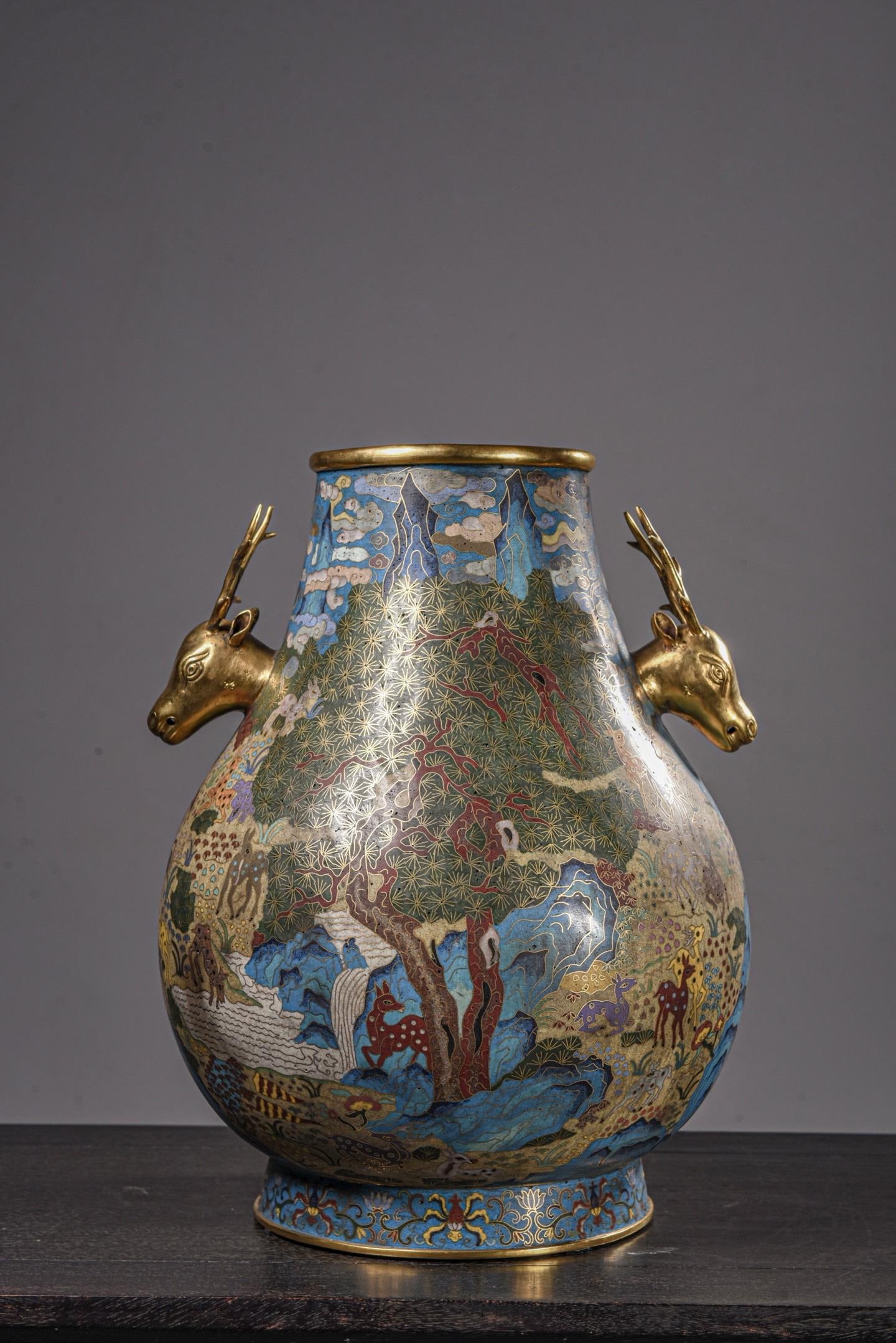 A Cloisonne Enamel Deer-Head Vase: A Cloisonne Enamel Deer-Head Vase. Height: 15.35in Diameter: 5.91in.