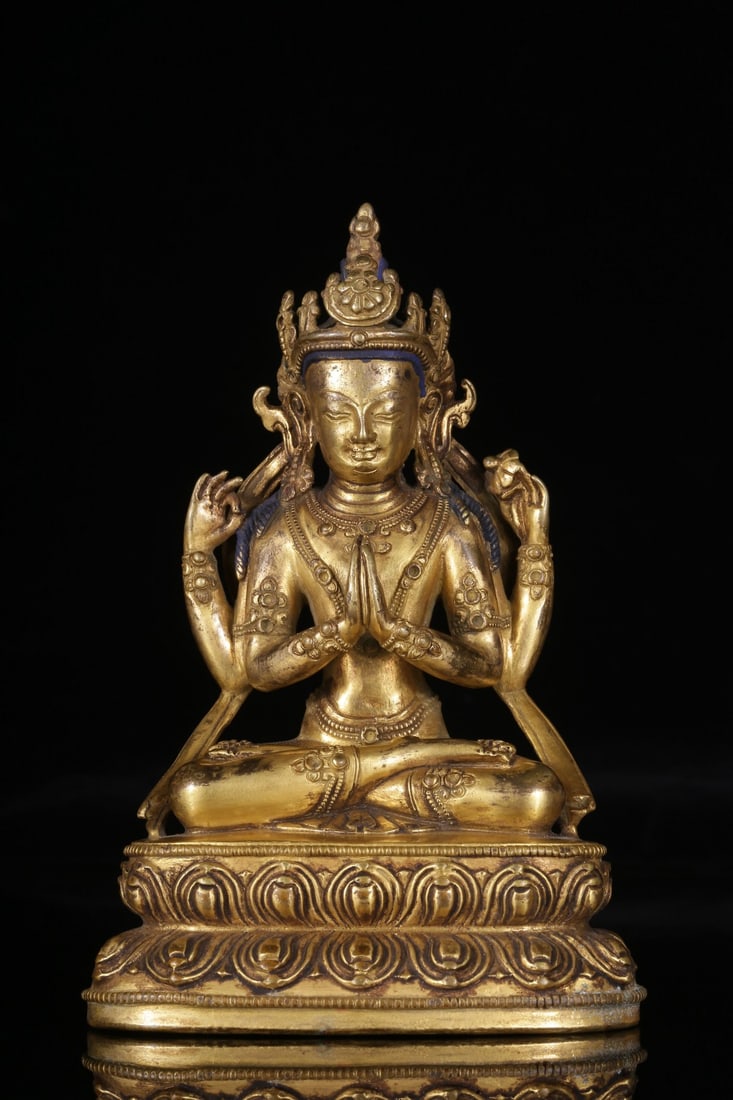 A Gilt Bronze Four-Armed Avalokiteshvara Statue: A Gilt Bronze Four-Armed Avalokiteshvara Statue. Height: 5.91in; Weight: 558g.