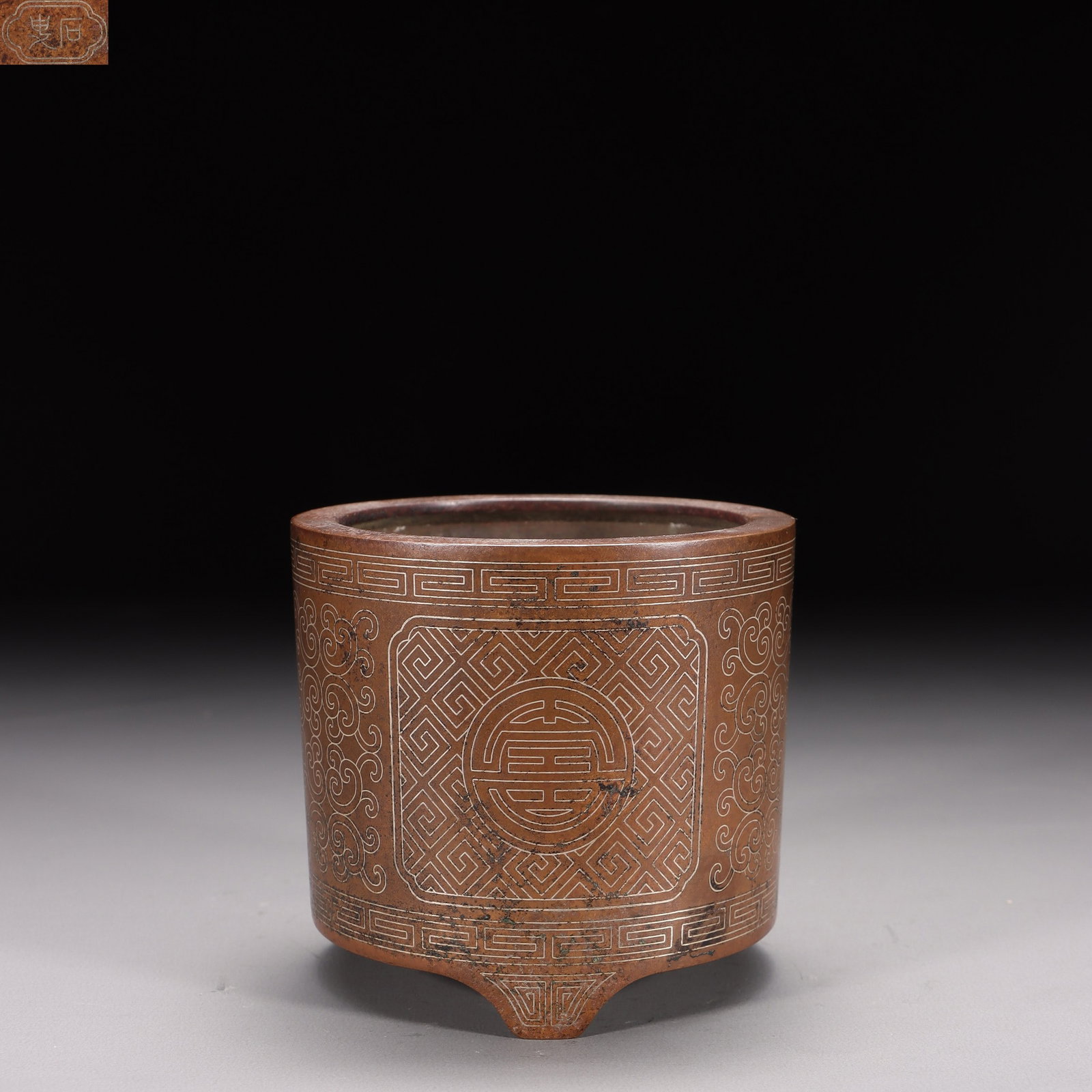A Bronze Inlaid Silver Tripod Censer: A Bronze Inlaid Silver Tripod Censer. Height: 3.15in Diameter: 3.46in; Weight: 887g.