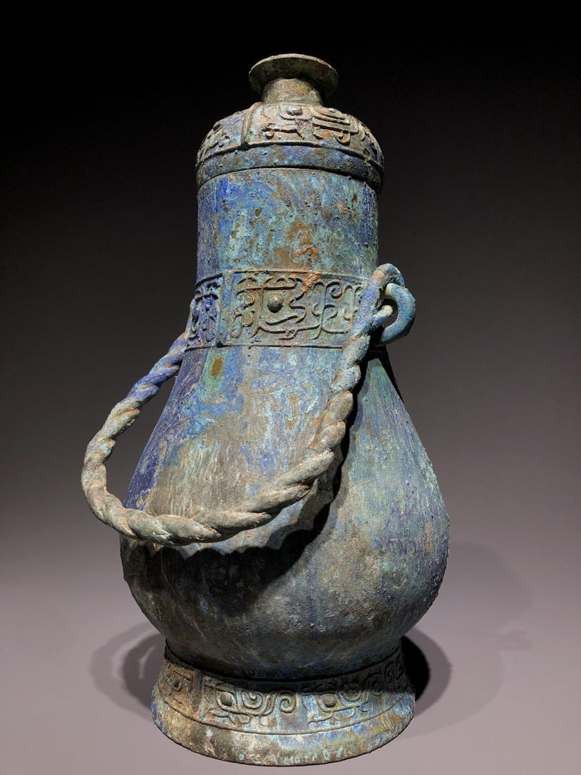A Bronze Handle Vessel - 4