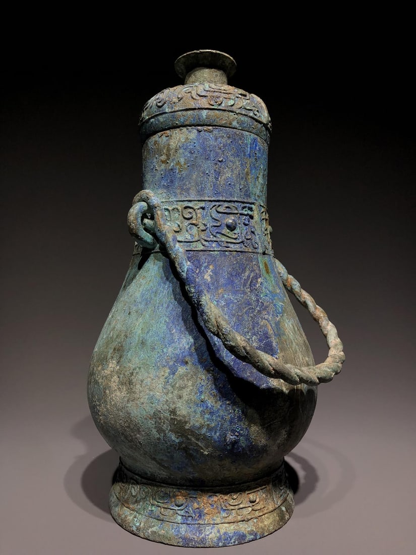 A Bronze Handle Vessel - 6