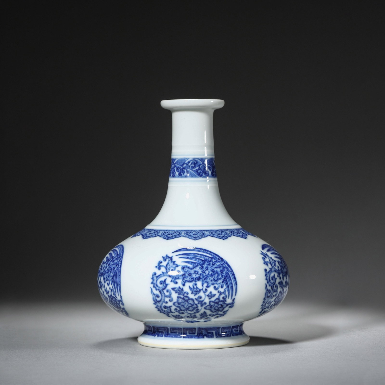 Blue and White Phoenix Neck Vase: Blue and White Phoenix Neck Vase. Dimensions: 4.72in x 5.91in.