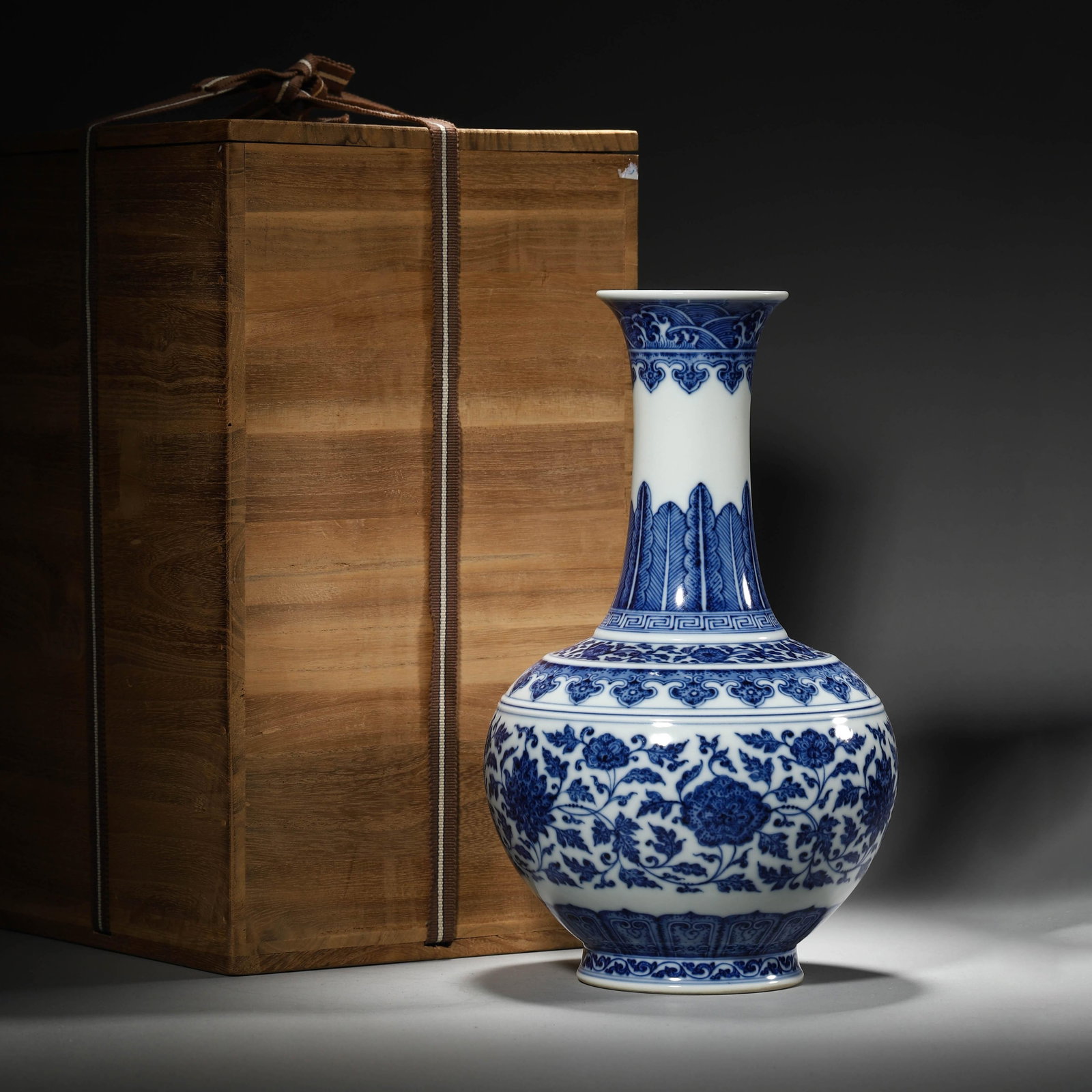 Blue and White Interlocking Lotus Vase: Blue and White Interlocking Lotus Vase. Dimensions: 6.30in x 10.43in.