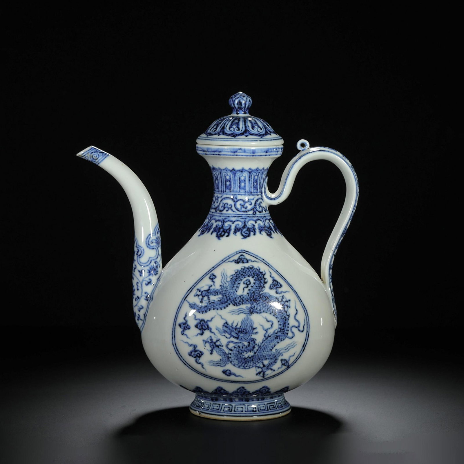 Blue and White Dragon Ewer: Blue and White Dragon Ewer. Dimensions: 8.66in x 5.31in x 10.24in.