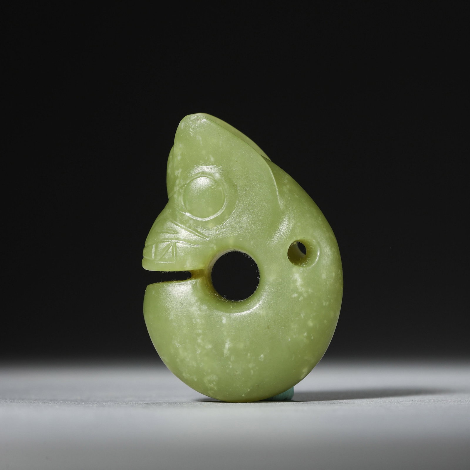 A Jade Pig Dragon: A Jade Pig Dragon. Dimensions: 1.42in x 0.63in x 2.05in.