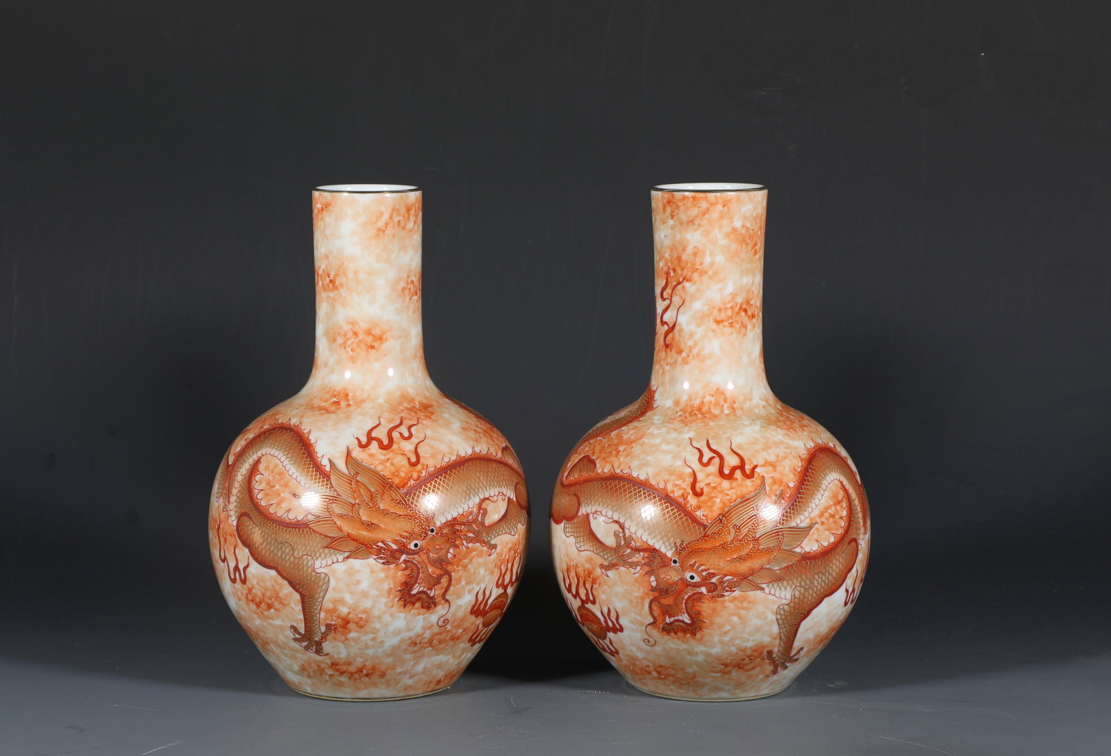 A Pair of Porcelain Vases: A Pair of Porcelain Vases. Dimensions: 8.75" x 5.2".