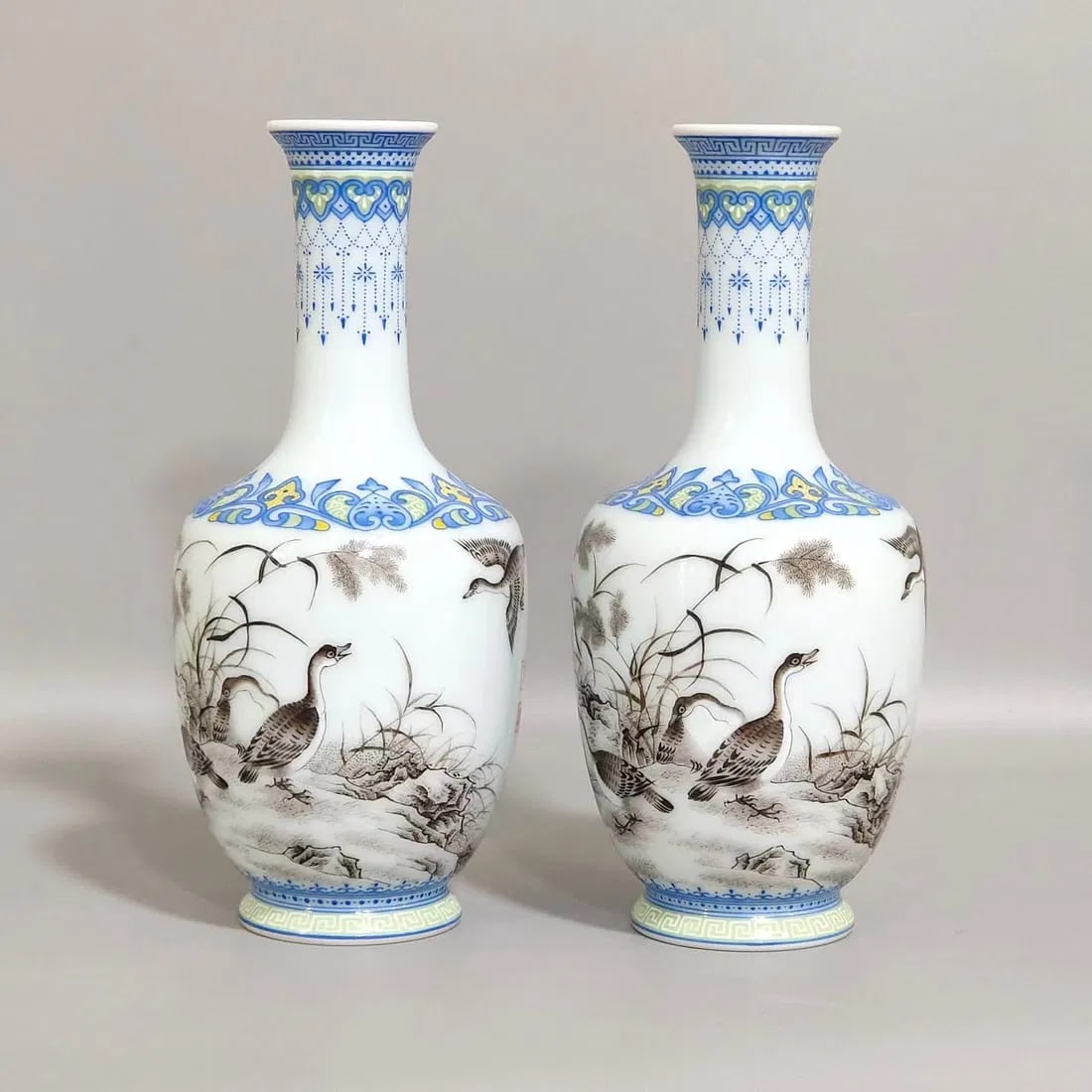 A Pair of Small Vase: A Pair of Small Vase with Falangcai Enamel and Mocai Enamel of Reeds and Geese. Dimensions: 5.75" x 2.5".