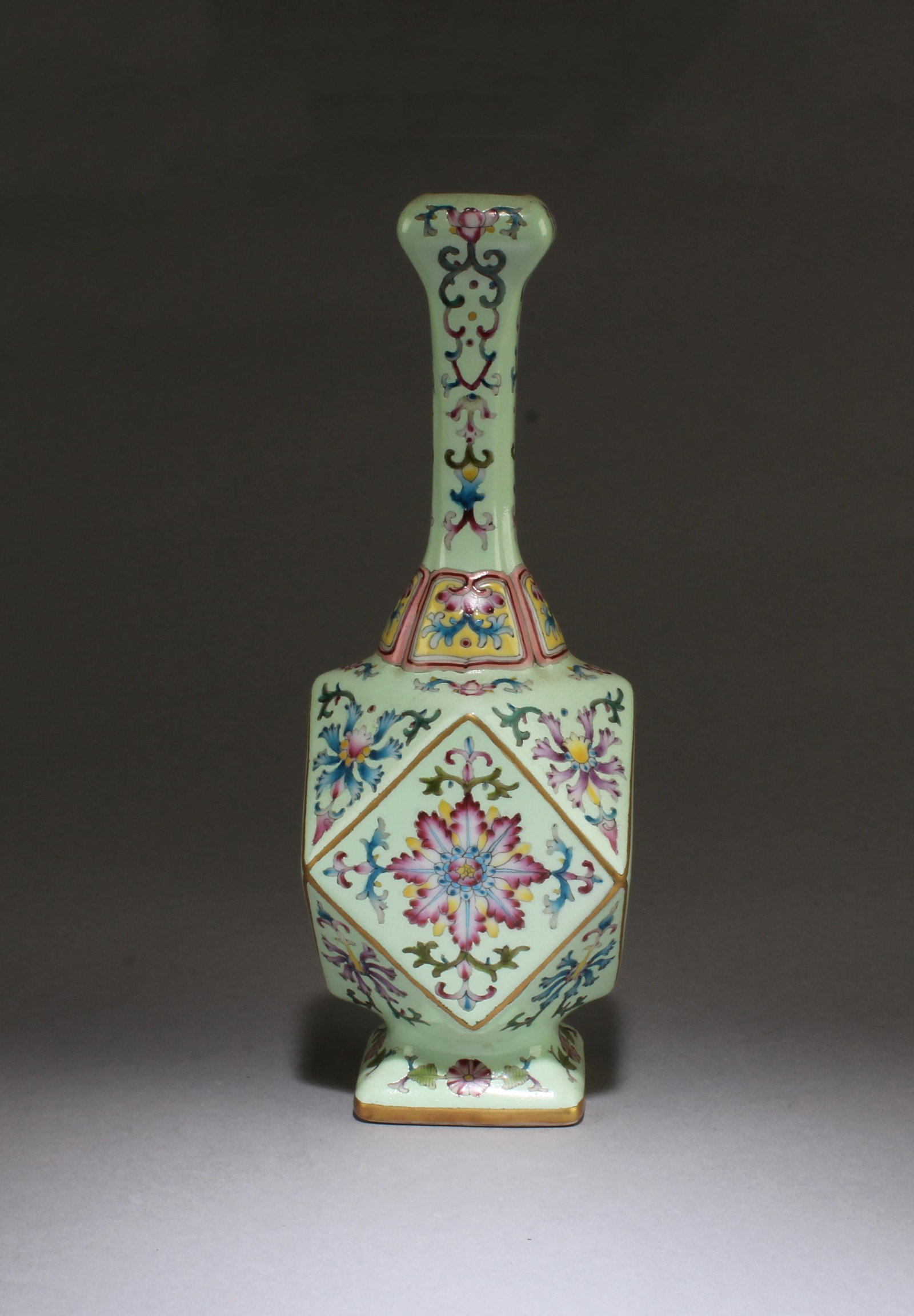 A Chinese Famille Verte Vase: A Chinese Famille Verte Vase. 'QianLong' mark at base. Height: 9.25"