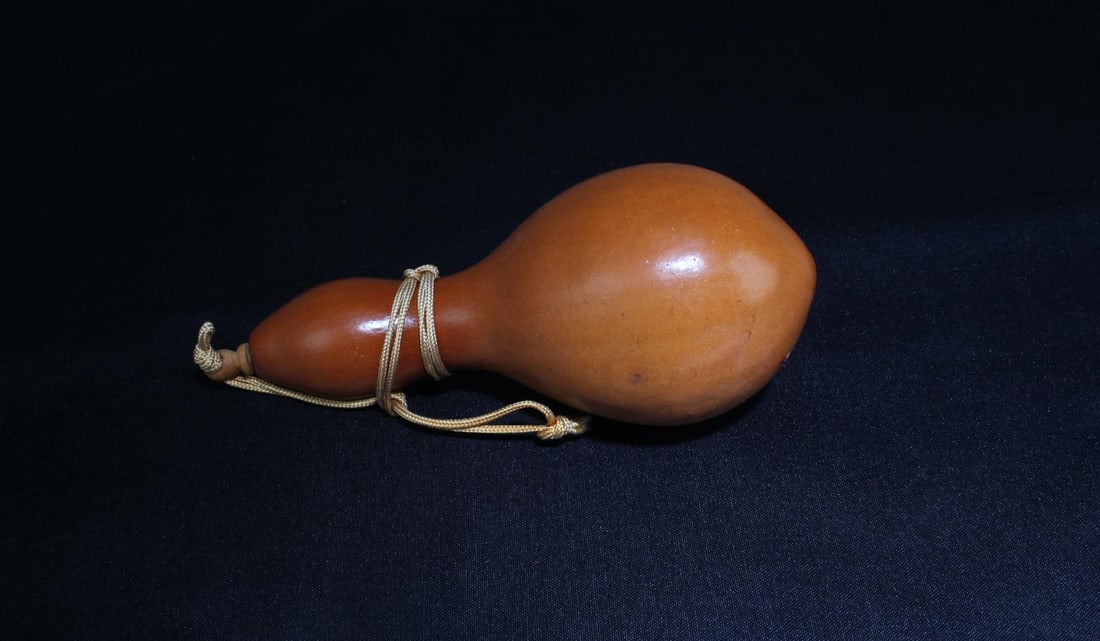 An Old Double Gourd Ornament: An Old Double Gourd Ornament. Height: 5.5"