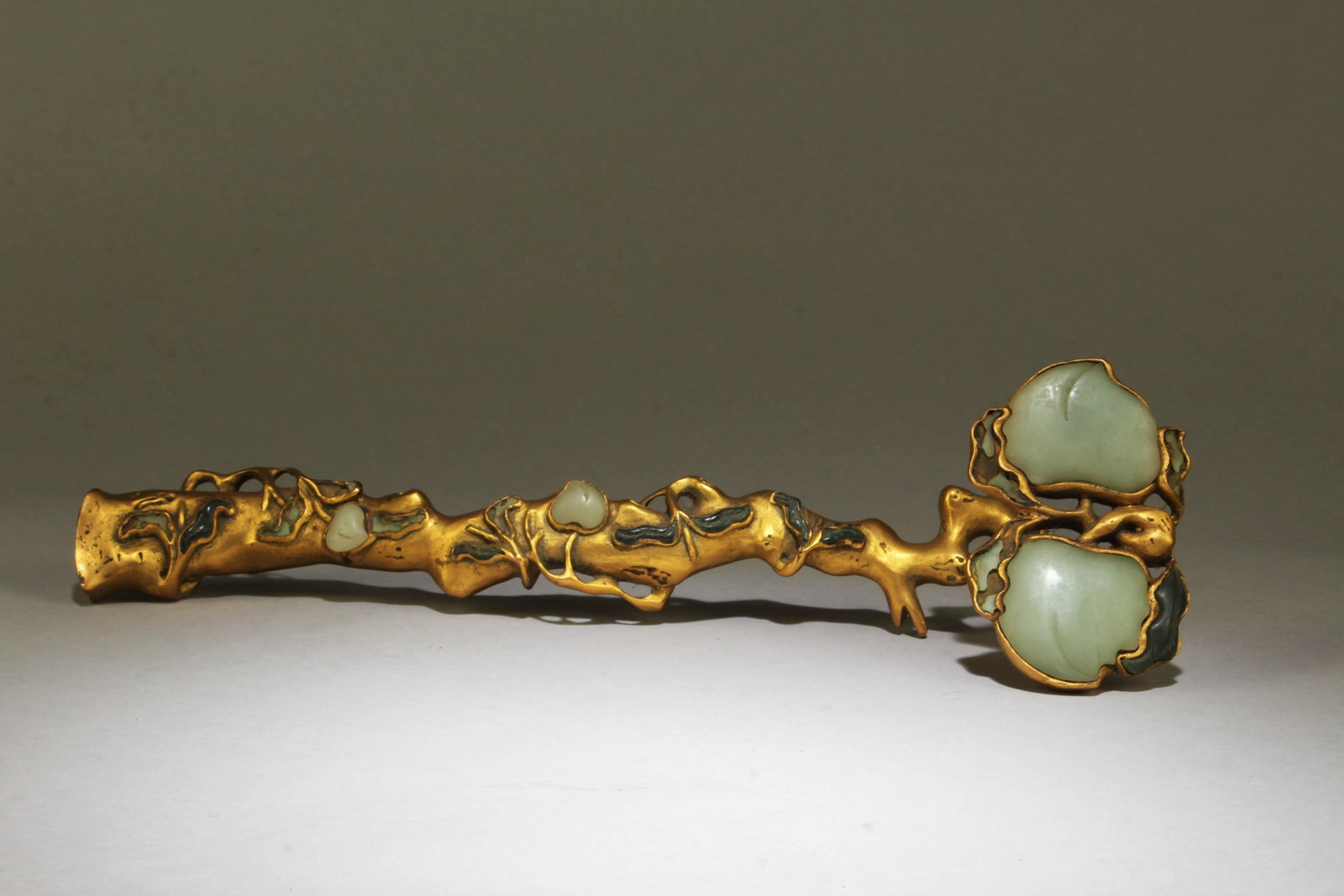 A Gilt Bronze Ruyi Scepter With Jade Inlay (1 of 6)