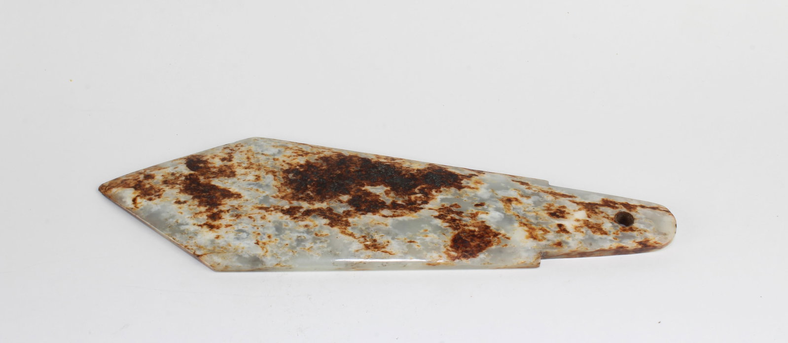 A Carved Jade Dagger Blade: A Carved Jade Dagger Blade. Length: 8.5"