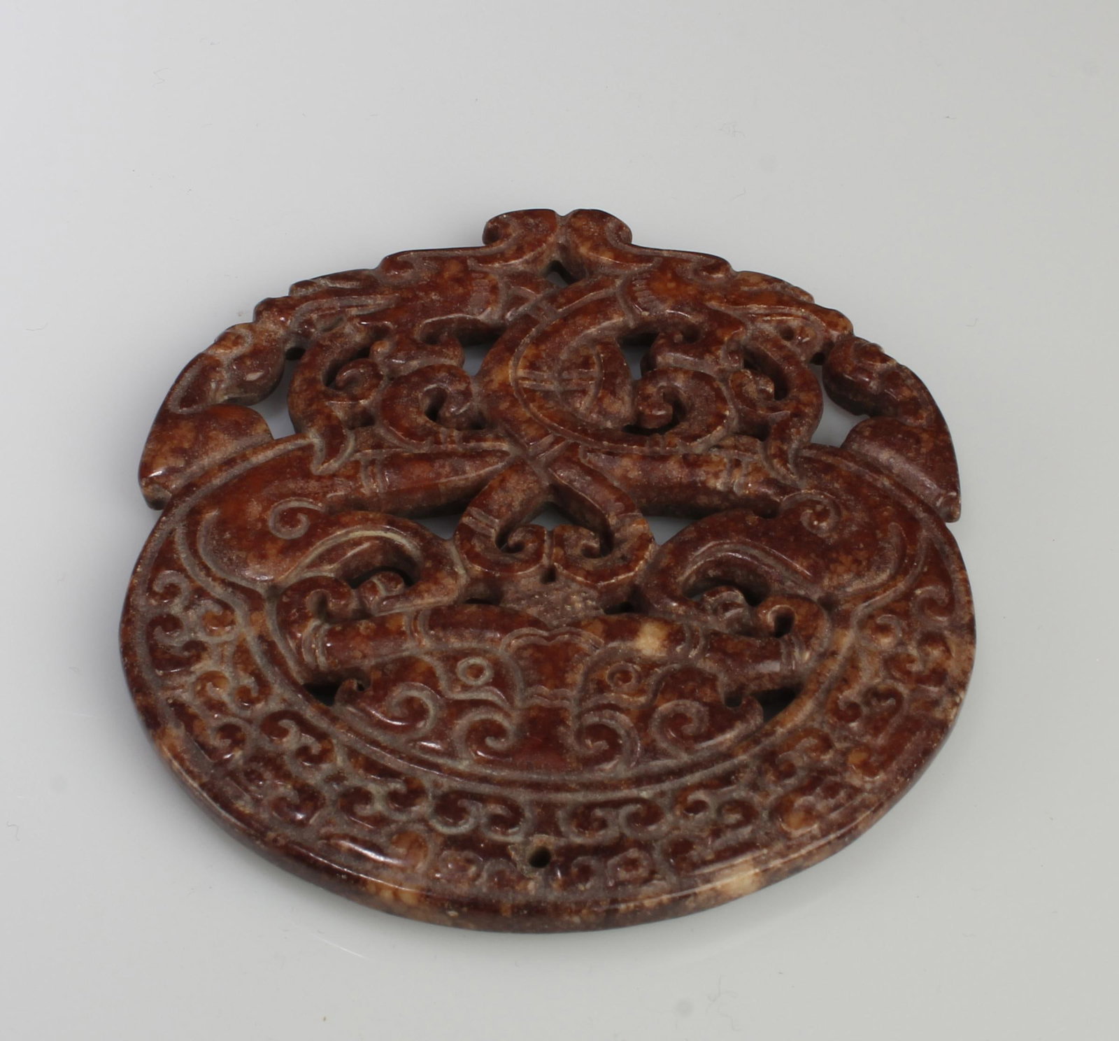 A Round Jade Pendant: A Round Jade Pendant. Diameter: 2.75"
