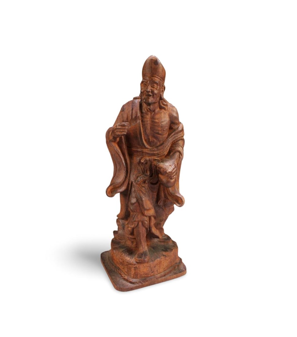 A Chinese Wooden Carved Immortal Statue: A Chinese Wooden Carved Immortal Statue. Height: 12.25"