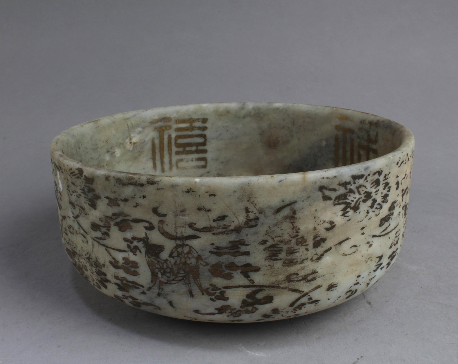 A Chinese Jadestone Bowl: A Chinese Jadestone Bowl. Diameter: 7.75"