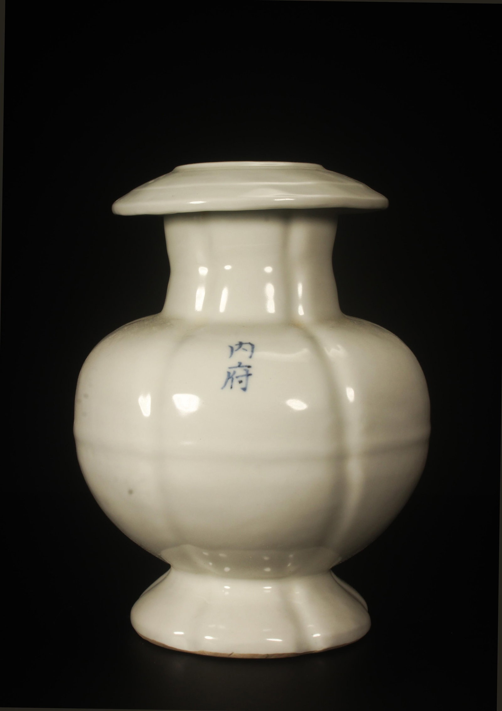 A White Vase: A White Vase. Dimensions: 8" x 6".