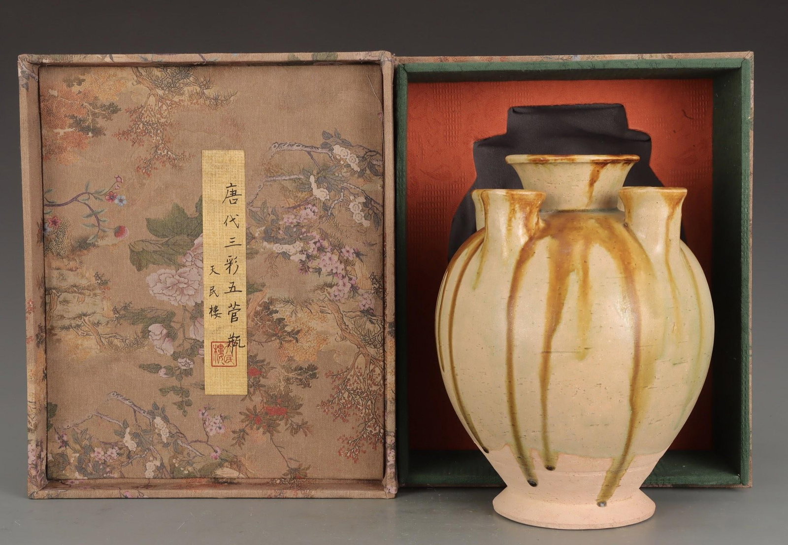 A Sancai Five-Spouted Vase: A Sancai Five-Spouted Vase. Height: 8.90in; Width: 6.93in.