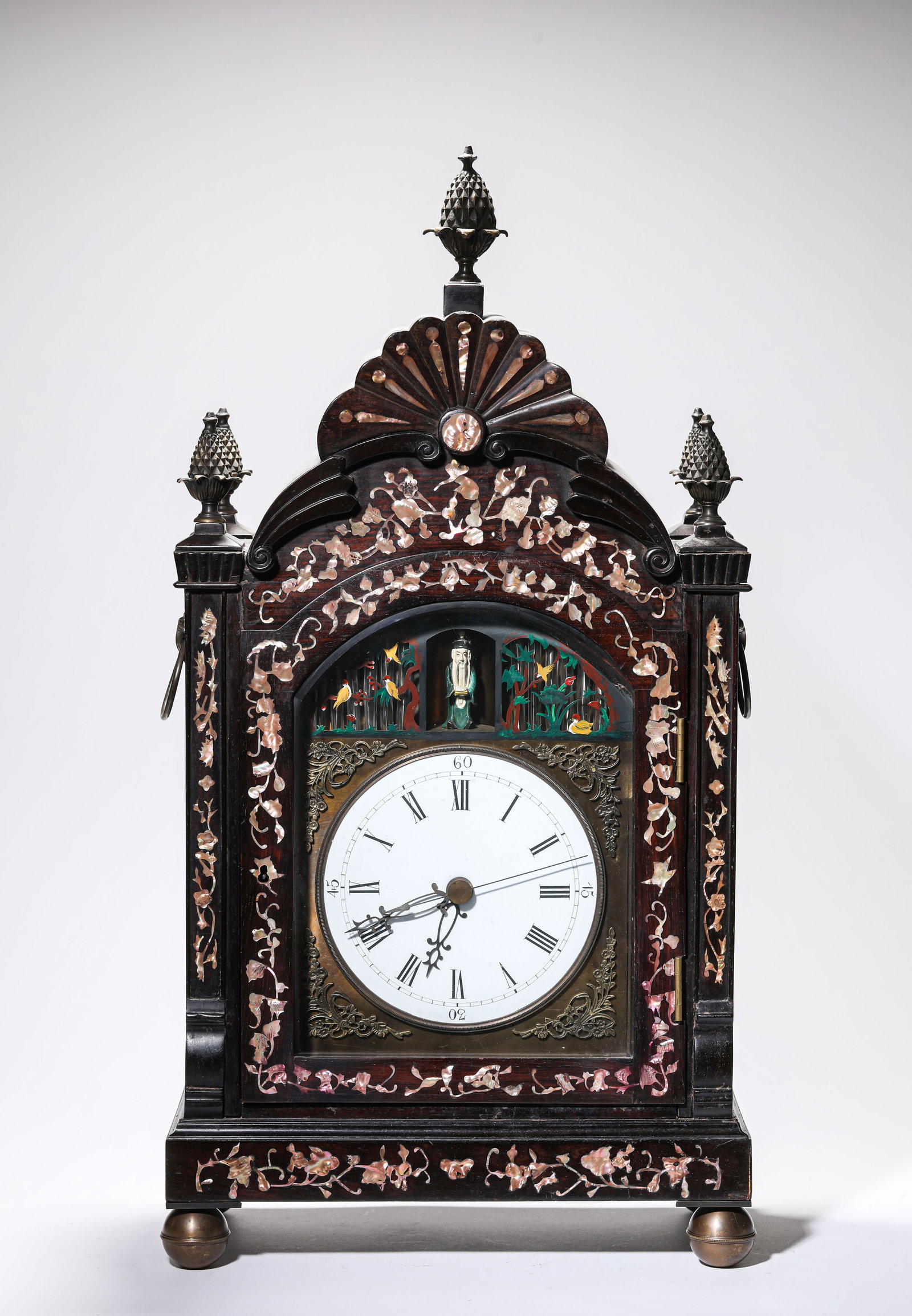 A Wood and Mother-of-Pearl-Inlaid 'Canton' Clock: A Wood and Mother-of-Pearl-Inlaid 'Canton' Clock. Dimensions: Weight: 13200 g. Length: 13.58" x Width: 6.69" x Height: 26.38". All measurements are approximate.