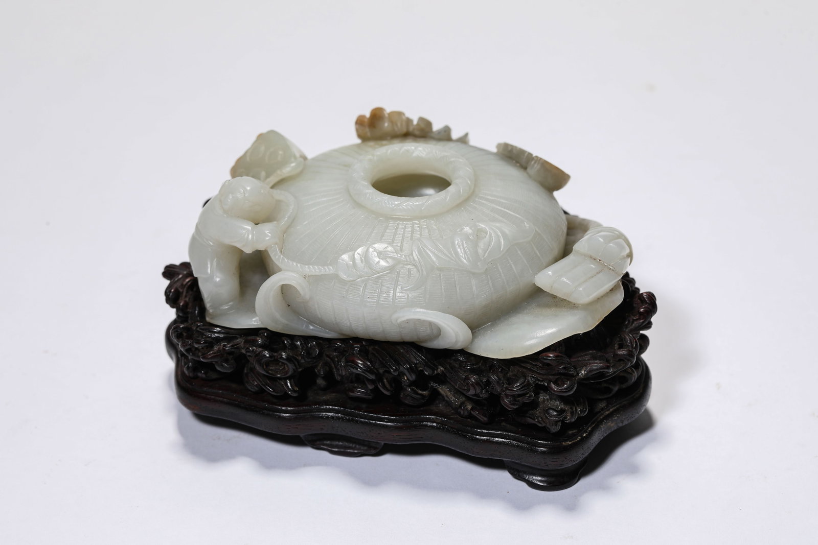 A Jade 'Carved Lotus Pond' Water Pot: A Jade 'Carved Lotus Pond' Water Pot. Dimensions: Length: 3.90" x Width: 2.83" x Height: 1.30". All measurements are approximate.