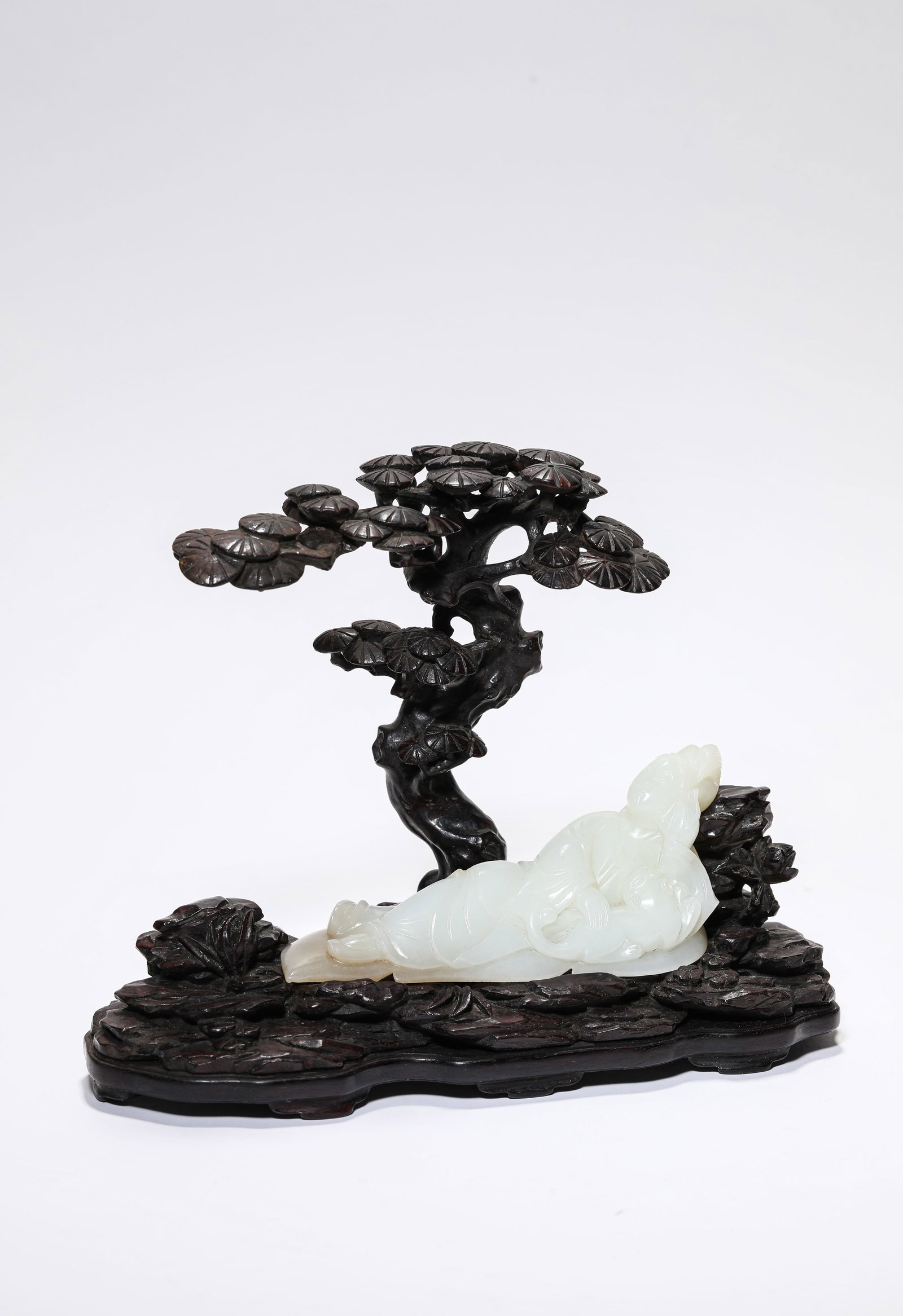 A Jade 'Carved Figure' Ornament: A Jade 'Carved Figure' Ornament. Dimensions: Length: 7.68" x Width: 3.74" x Height: 5.83". Length: 4.72" x Width: 1.81" x Height: 1.77". All measurements are approximate.
