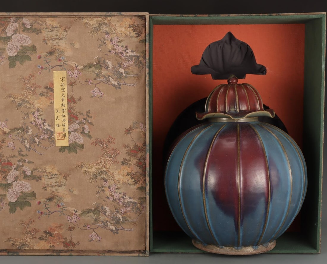 A Jun Ware Covered Jar: A Jun Ware Covered Jar. Height: 16.46in; Width: 13.78in.