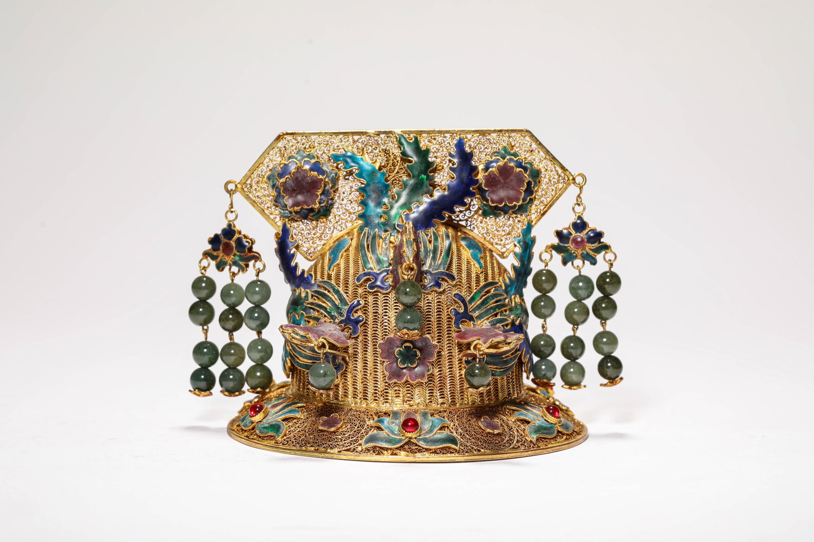 A Gilt-Bronze 'Phoenix' Headdress: A Gilt-Bronze 'Phoenix' Headdress. Dimensions: Weight: 400 g. Width: 5.35" x Height: 4.72". All measurements are approximate.