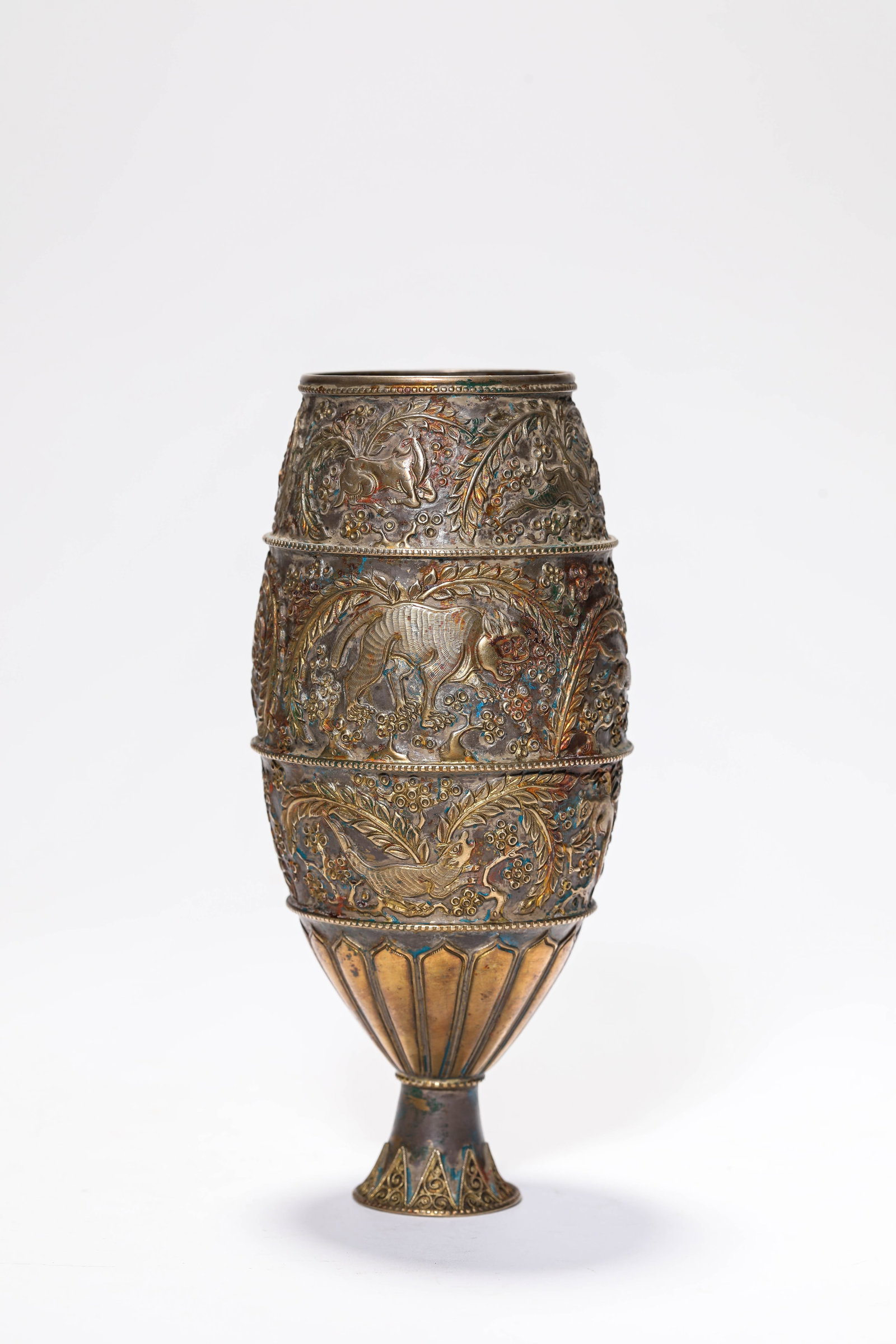 A Gilt-Silver 'Auspicious Beast' Cup: A Gilt-Silver 'Auspicious Beast' Cup. Dimensions: Weight: 177 g. Width: 3.07" x Height: 6.65". All measurements are approximate.