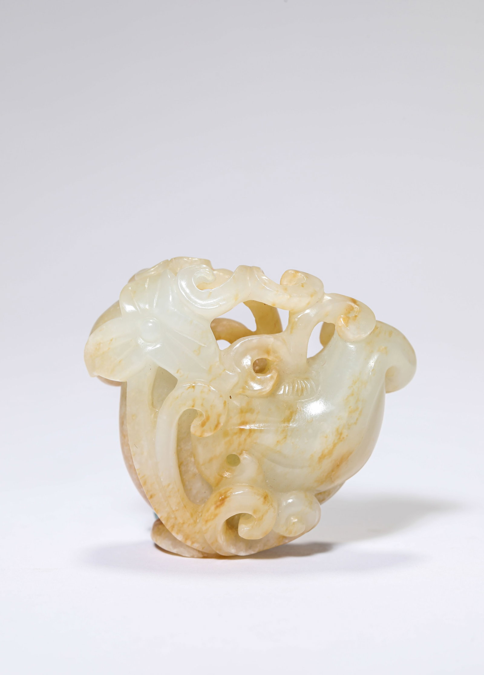 A Jade Hand Ornament: A Jade Hand Ornament. Dimensions: Length: 2.17" x Width: 0.87" x Height: 2.01". All measurements are approximate.