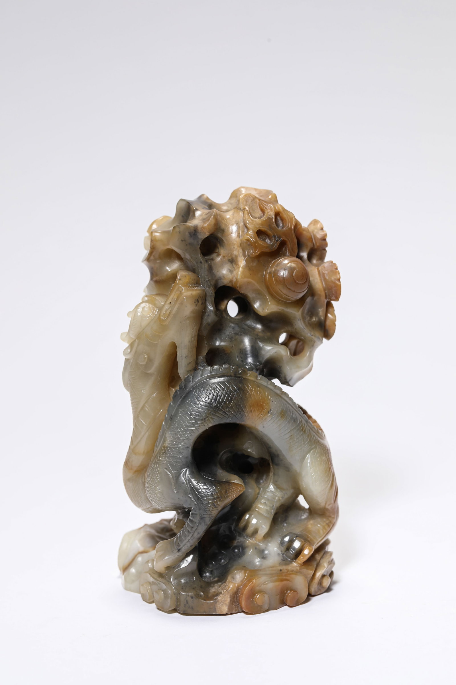 A Jade 'Carved Dragon' Ornament: A Jade 'Carved Dragon' Ornament. Dimensions: Length: 2.68" x Width: 2.56" x Height: 4.72". All measurements are approximate.