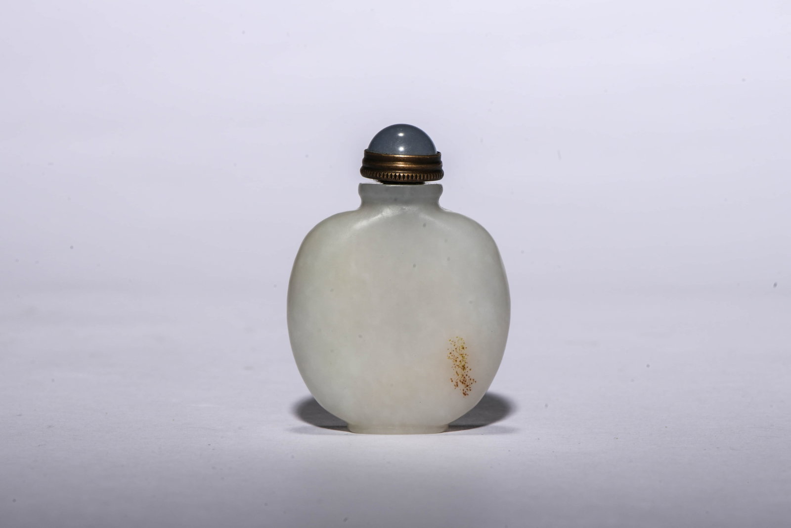 A Hetian Jade Snuff Bottle: A Hetian Jade Snuff Bottle. Dimensions: Width: 2.36" x Height: 1.69". All measurements are approximate.