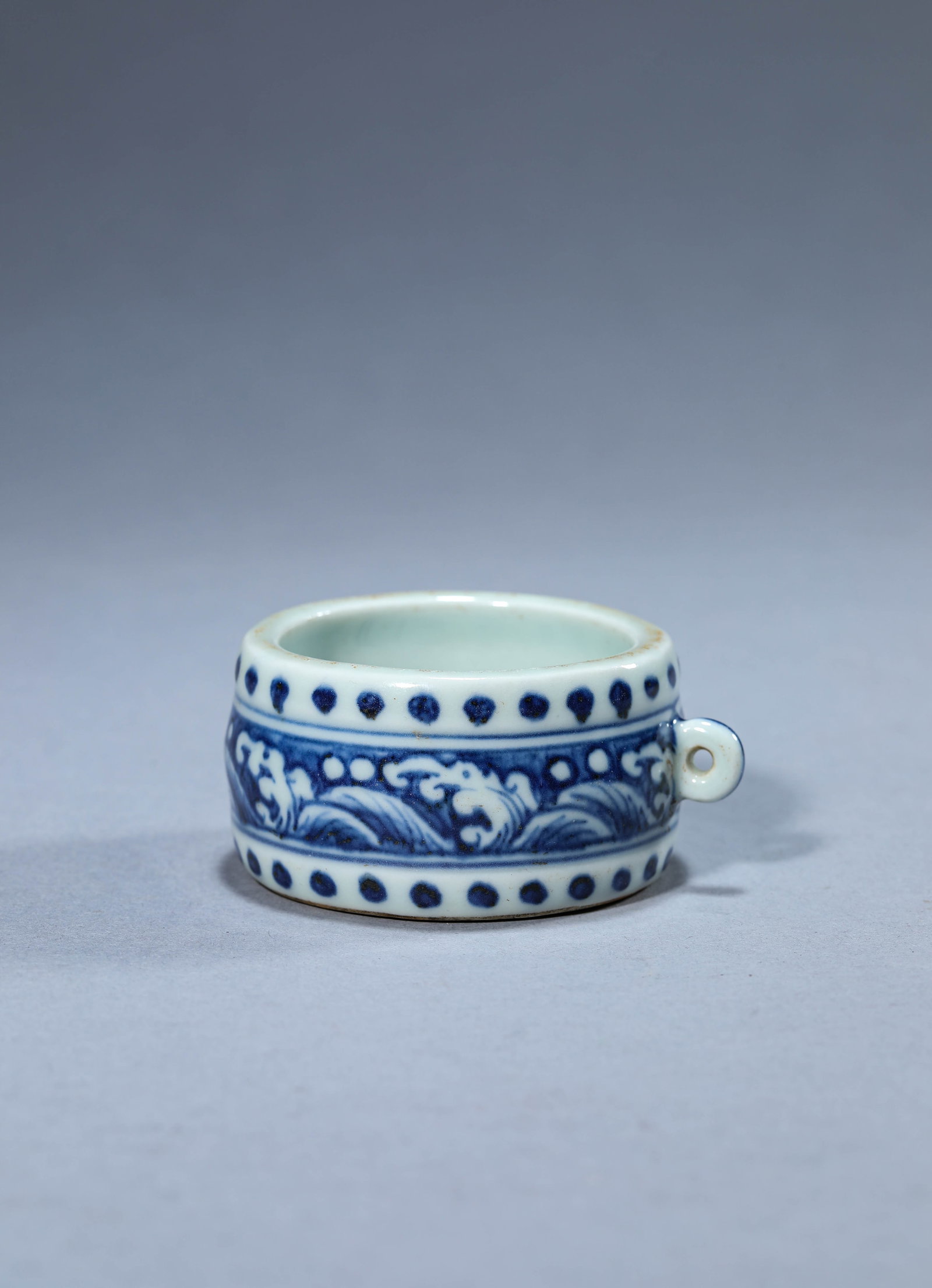 A Blue and White 'Bird' Feeder: A Blue and White 'Bird' Feeder. Dimensions: Length: 3.03" x Width: 2.68" x Height: 1.42". All measurements are approximate.