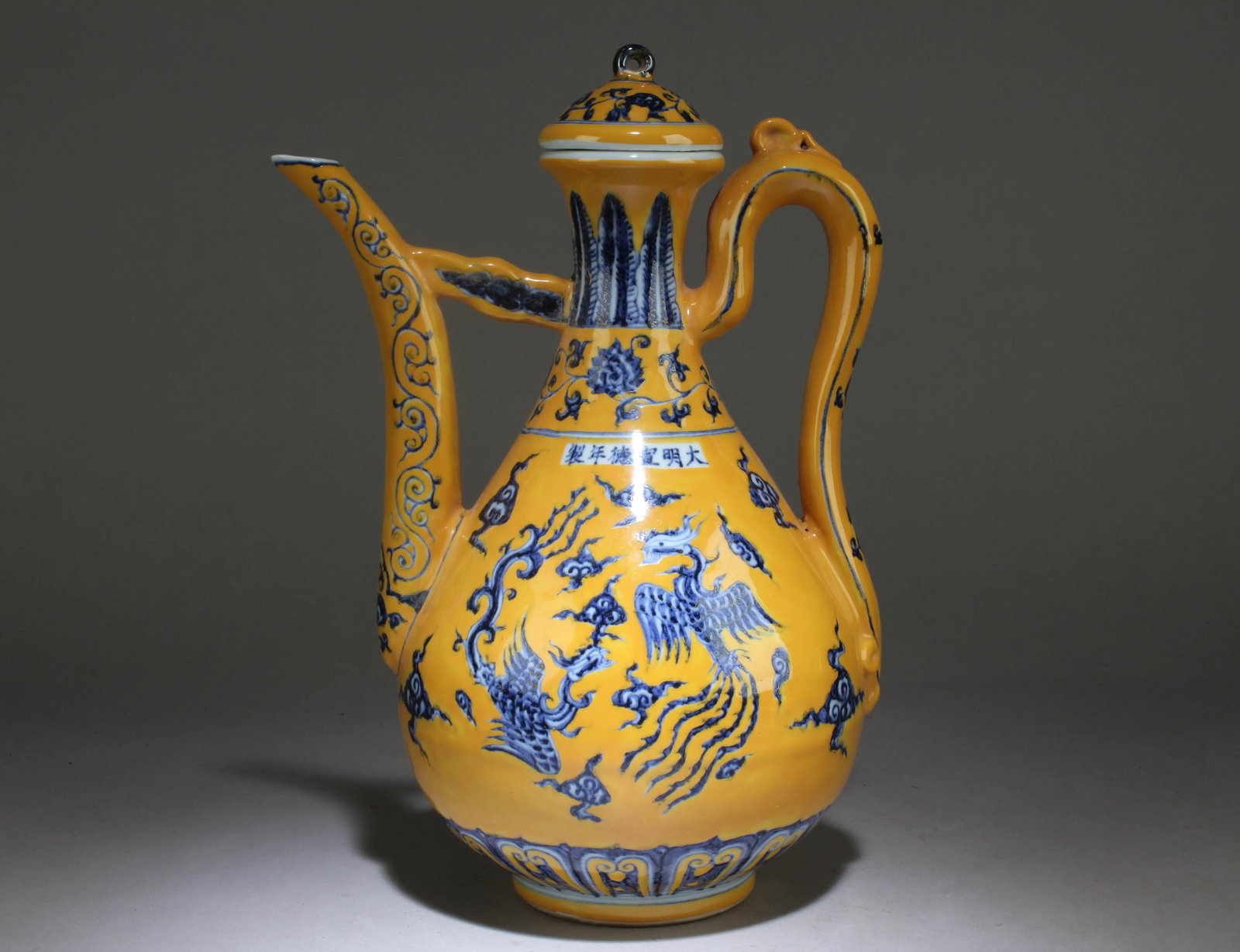 A Chinese Blue and White Yellow Glazed Teapot: A Chinese Blue and White Yellow Glazed Teapot. Dimension: 12.75" x 9" x 6.75".