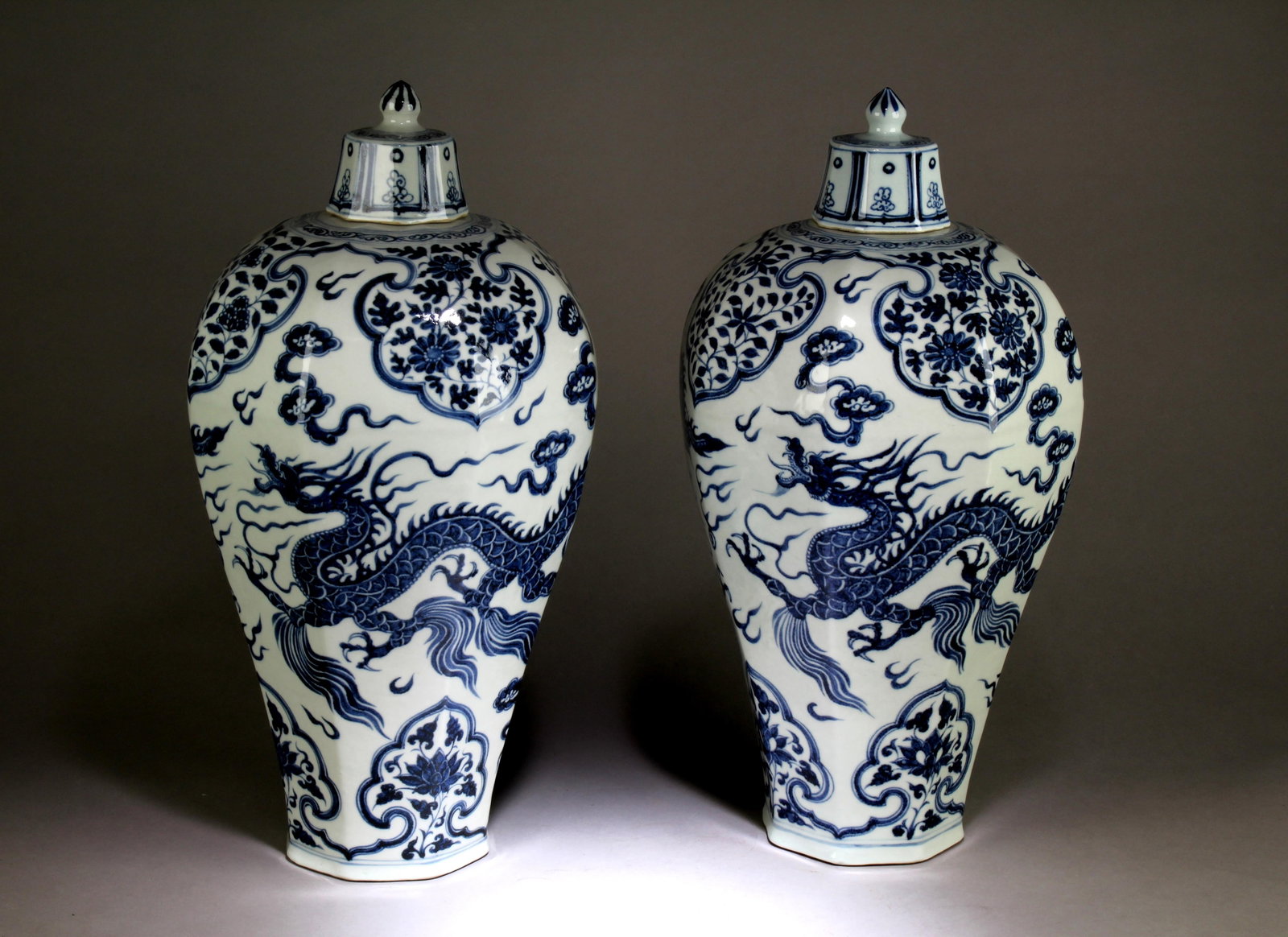 A Set of 2 Chinese Meiping Vase: A Set of 2 Chinese Blue and White Dragon Design Meiping Vase with Lid. Dimension: 19.75" x 10.5".