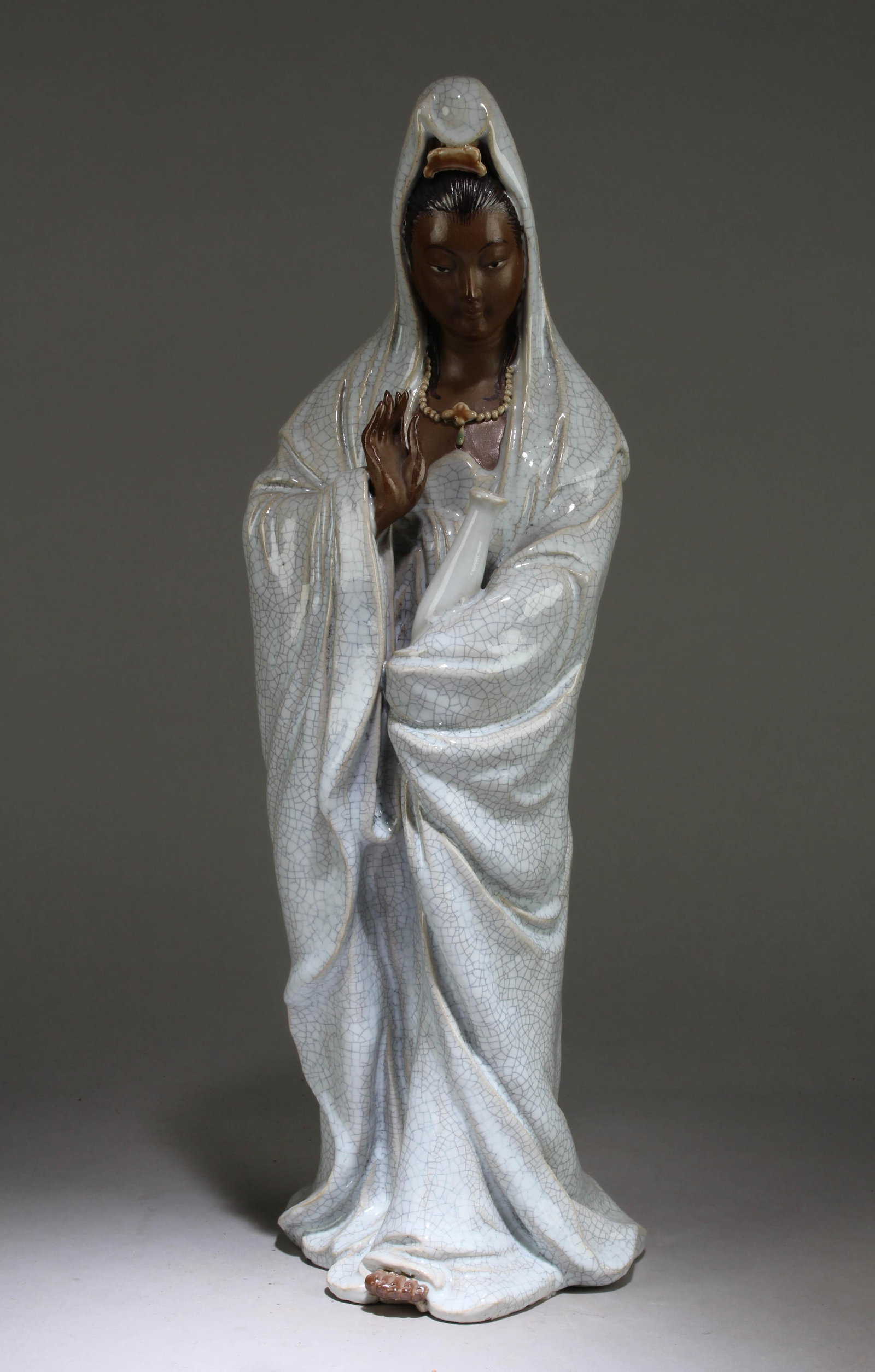 A Chinese Siwan Quanyin Statue: A Chinese Siwan Quanyin Statue. Dimension: 18.75" x 6".