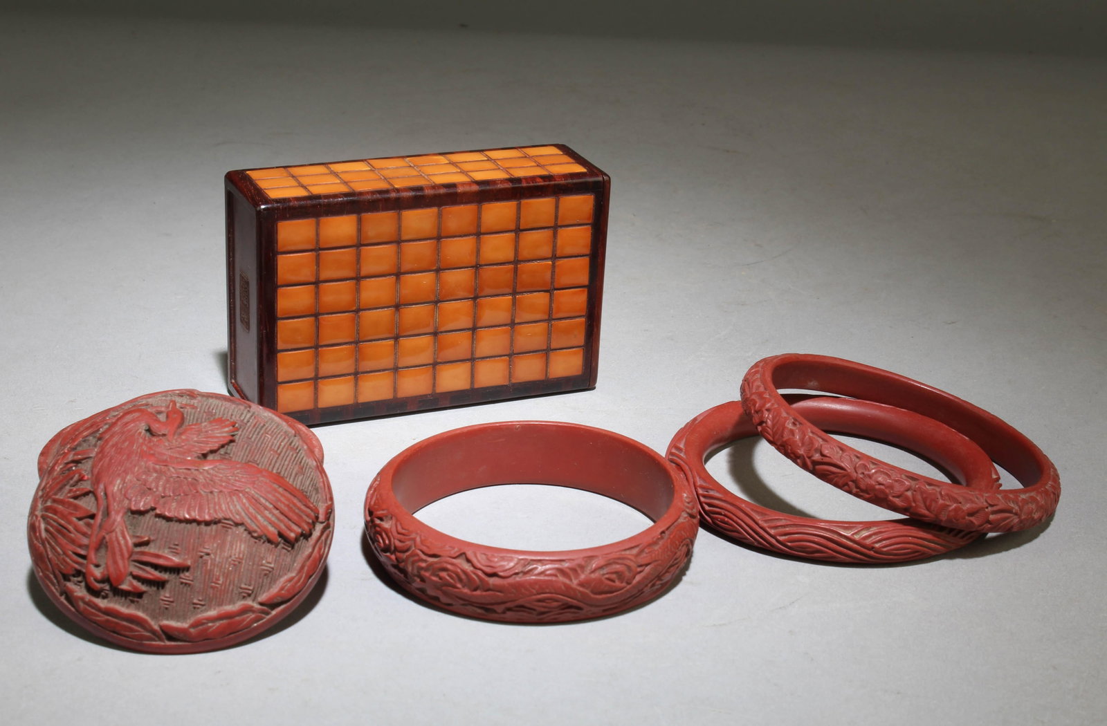 A Set of 4 Cinnabar Items with One Wooden Box: A Set of 4 Cinnabar Items with One Wooden Box. Dimension Range: 0.3" x 3.2" to 1.75" x 2.5".