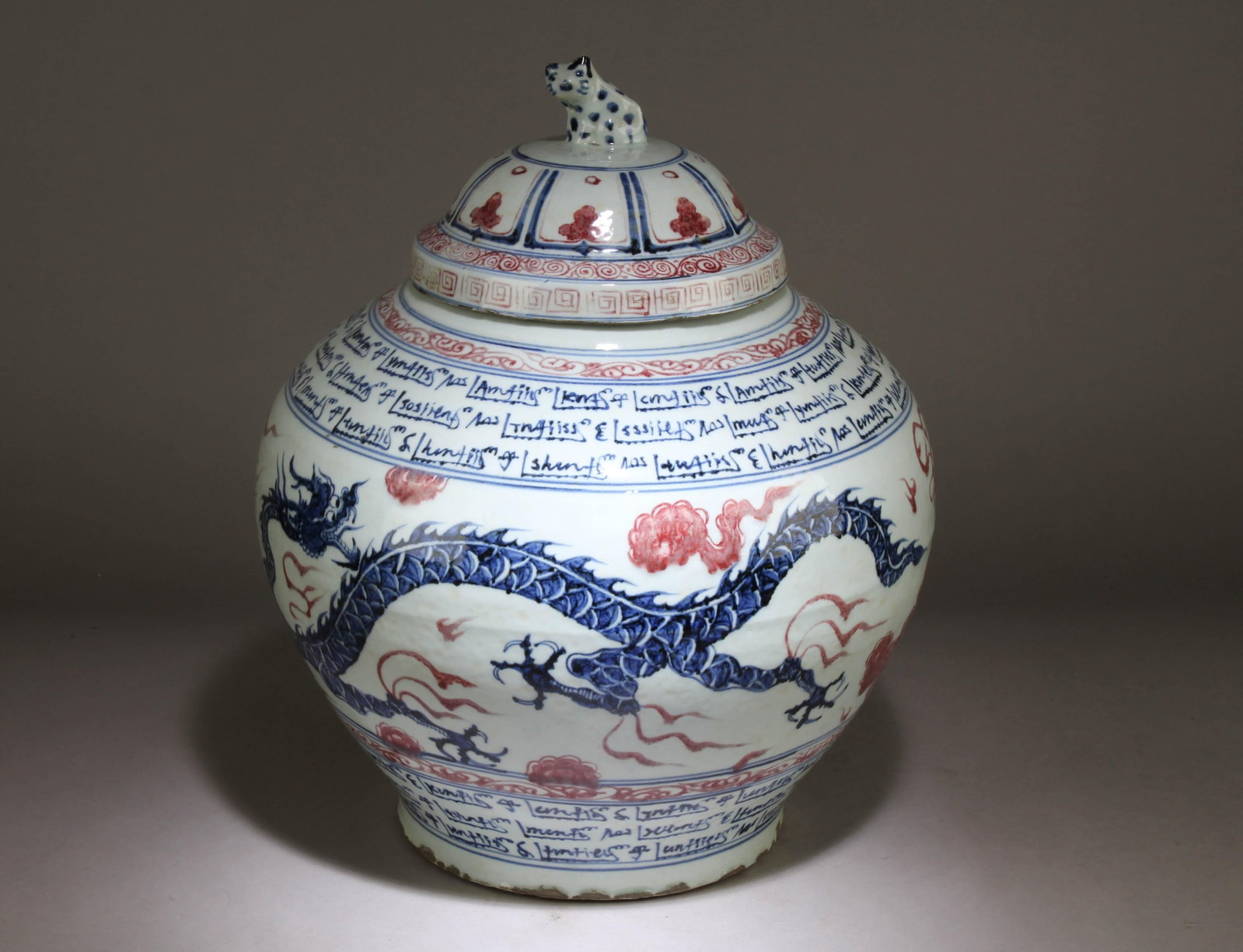 A Chinese Blue and White Iron Red Design Pot: A Chinese Blue and White Iron Red Design Pot with Lid. Dimension: 15.5" x 13".