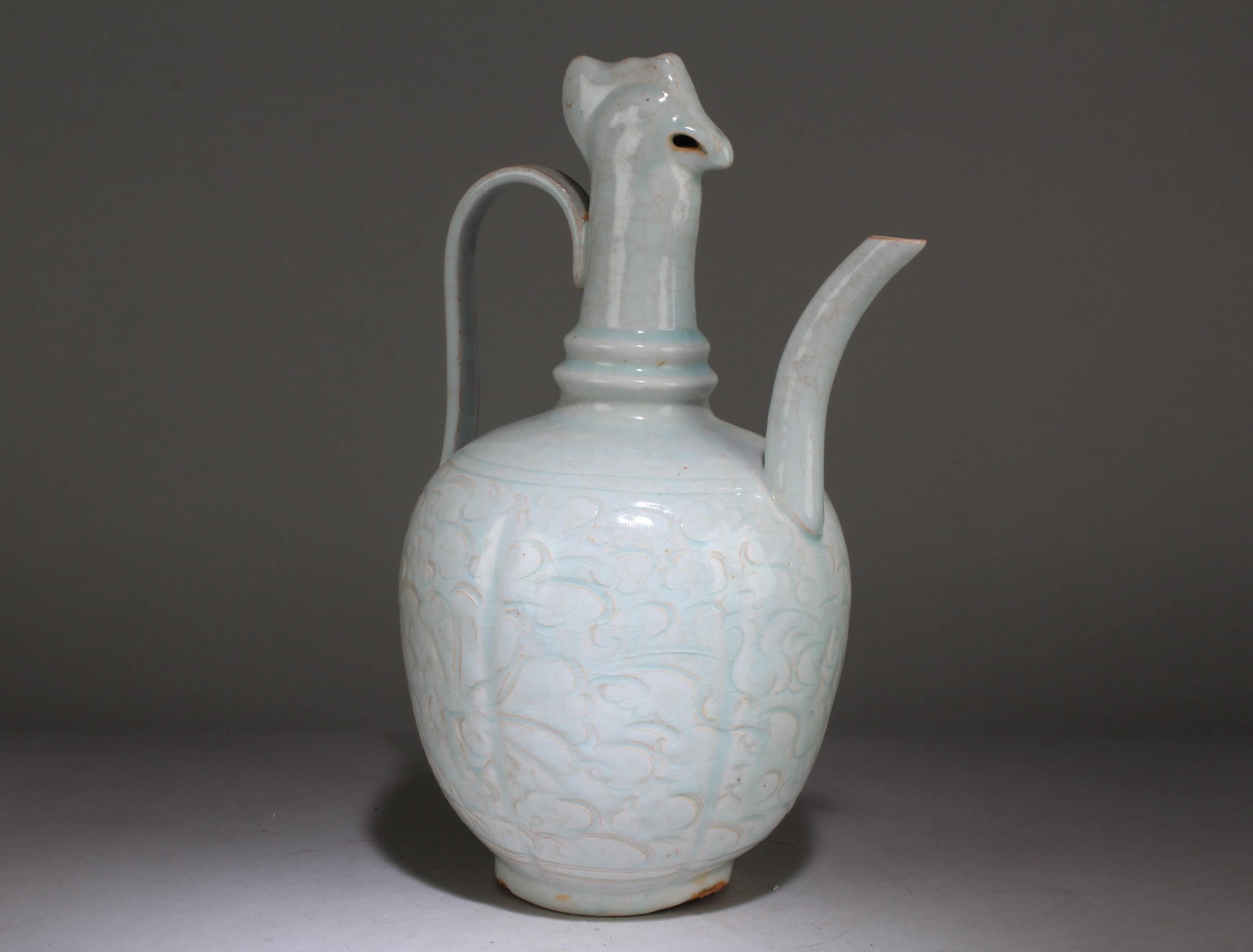 A Chinese Celedon Teapot: A Chinese Celedon Teapot . Dimension: 12" x 7.75" x 6.5".