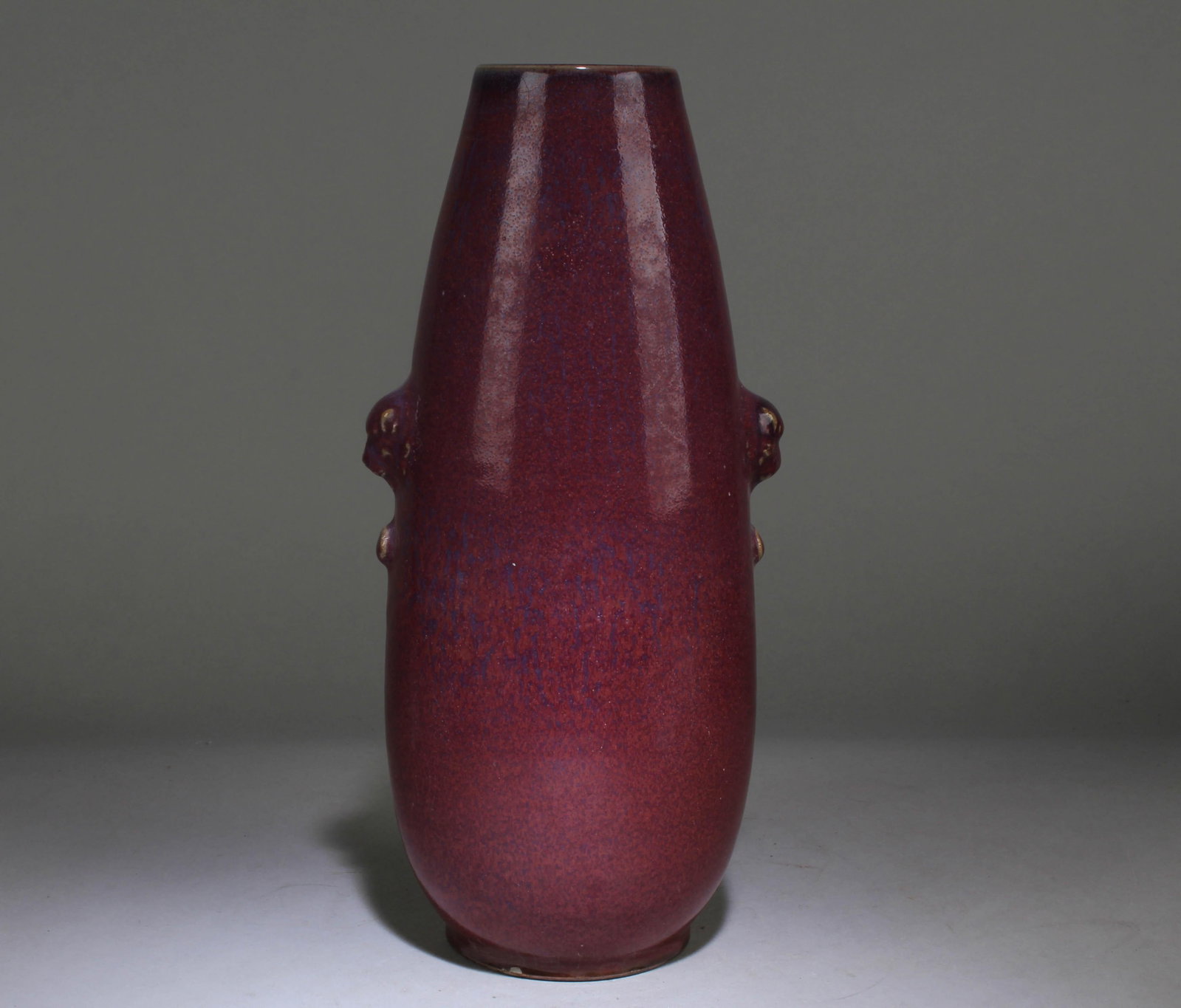 A Chinese Monochrome Red JunYao Vase: A Chinese Monochrome Red MeiPing Vase . Dimension: 11.5" x 5" x 4.25".