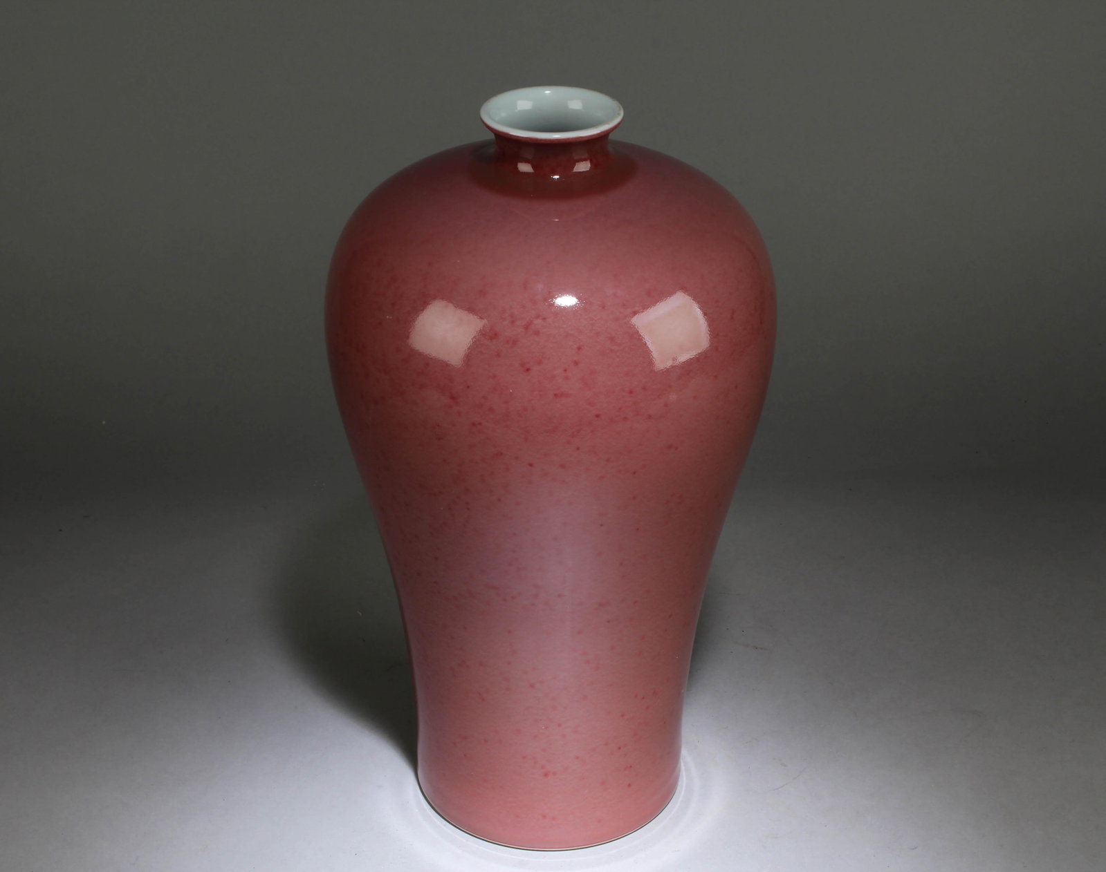 A Chinese Peach Bloom MeiPing Vase: A Chinese Peach Bloom MeiPing Vase. Dimension: 13.25" x 7".