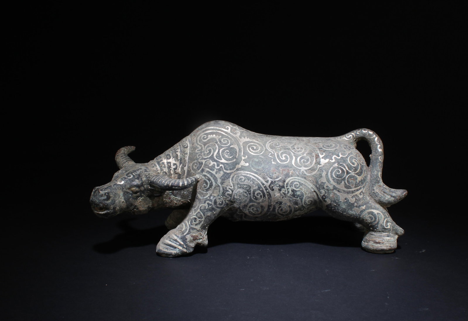 A Chinese Bronze Animal Figure Statue: A Chinese Bronze Animal Figure Statue. Dimensions: 11" x 5"