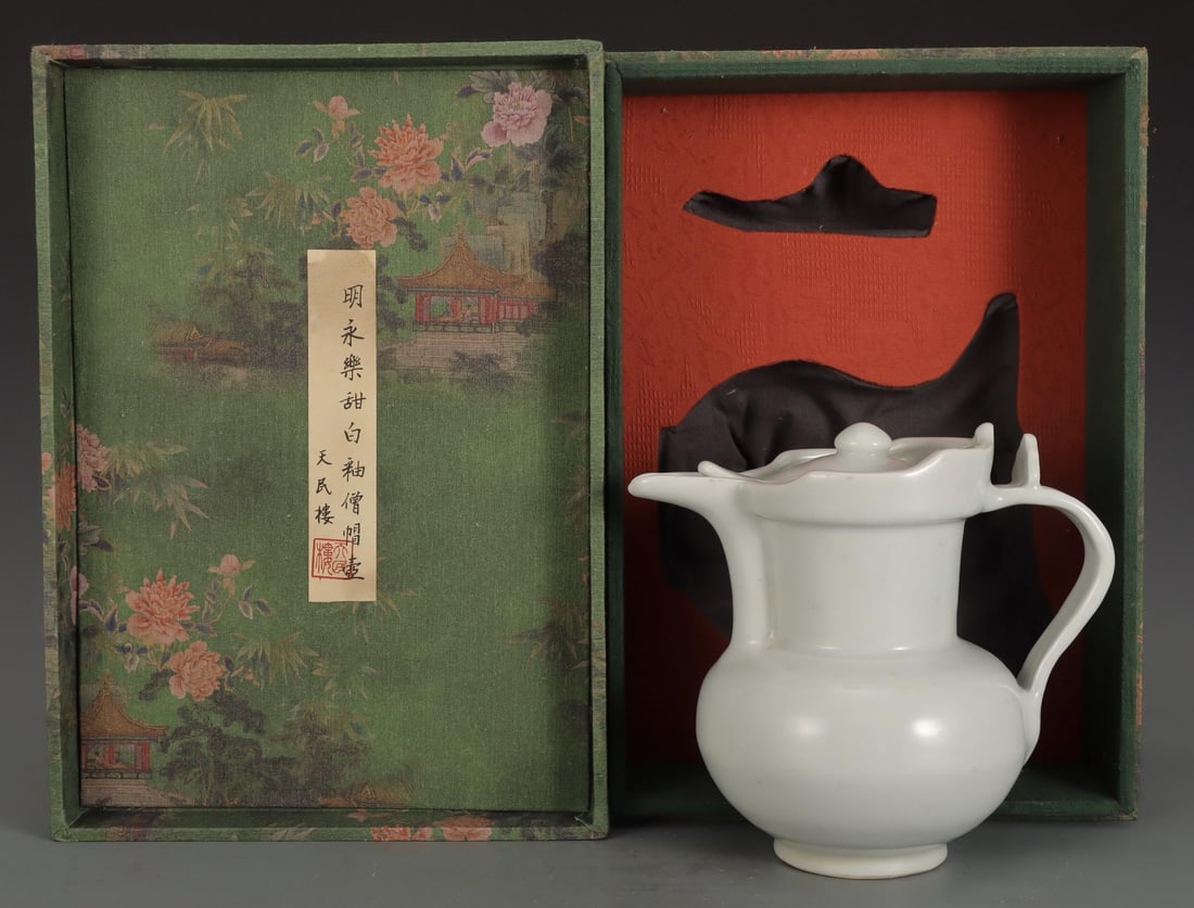 A Sweet White Glazed Monk’s Cap Ewer: A Sweet White Glazed Monk’s Cap Ewer. Dimensions: 7.32in x 8.27in.