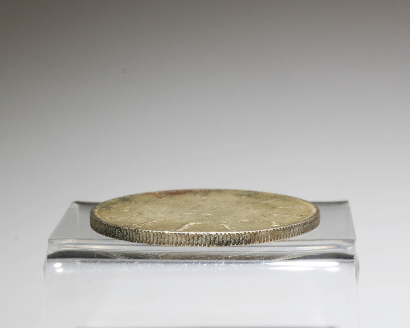 A Silver Coin - 3