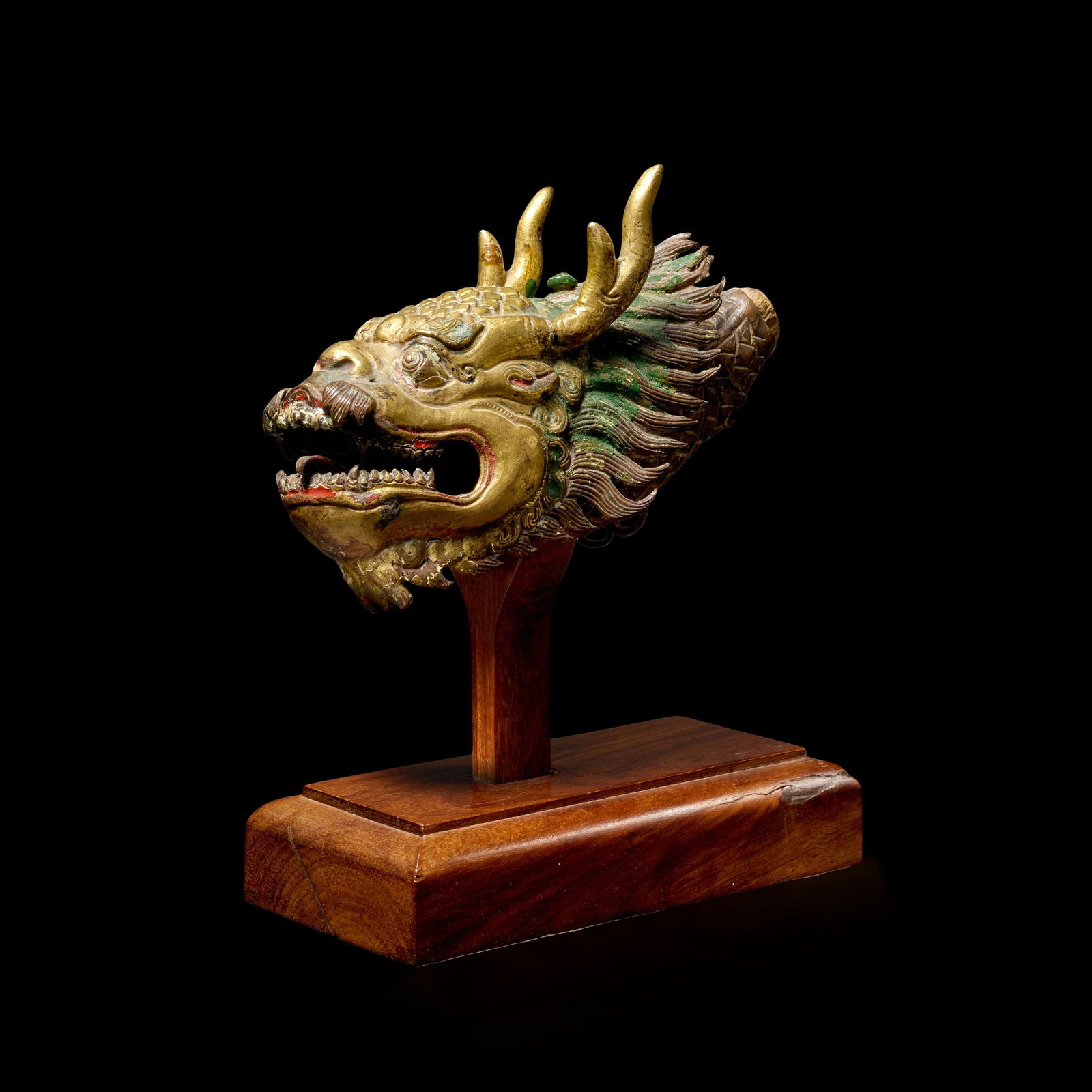 A GILT COPPER ALLOY REPOUSSE DRAGON HEAD: Provenance: TIBET, 18TH/19TH CENTURYTraces of polychrome.Himalayan Art Resources item no. 88067 in. (17.8 cm) highProvenanceHollywood Galleries, Hong Kong, 2007???The Robert and Lois Baylis