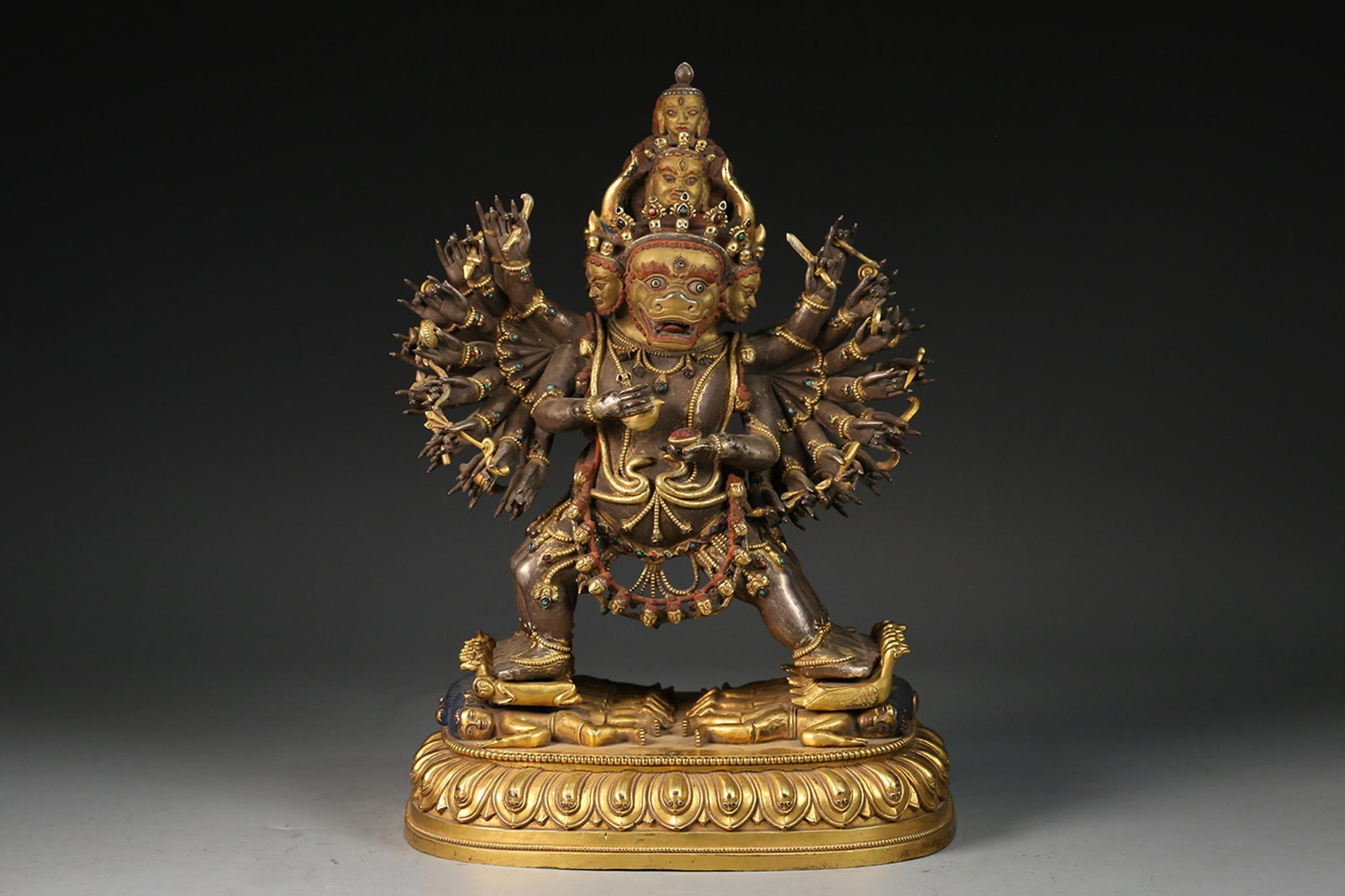 A Gilt Bronze & Silver Tibetan Deity Statue: A Gilt Bronze & Silver Tibetan Deity 'Da Wei De Jin Gang' Statue. Height: 13.3"