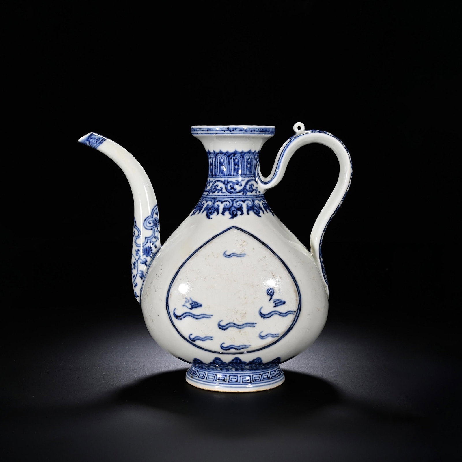 Blue and White Ewer: Blue and White Ewer. Length:9.25" Width:5.12" Height:8.46"