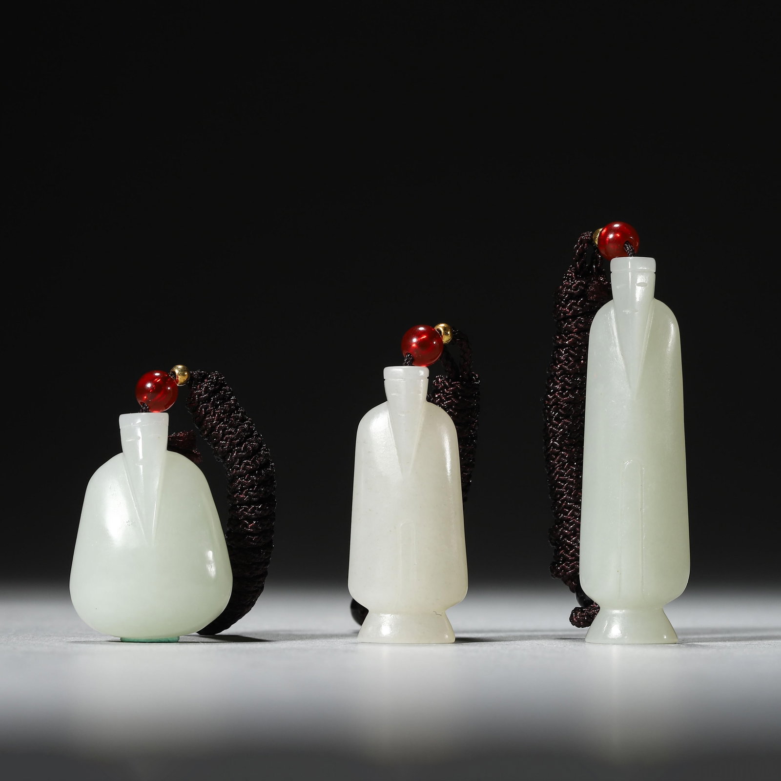 Jade Zhongweng, Set of Three: Jade Zhongweng, Set of Three. Height:1.30"-2.20"