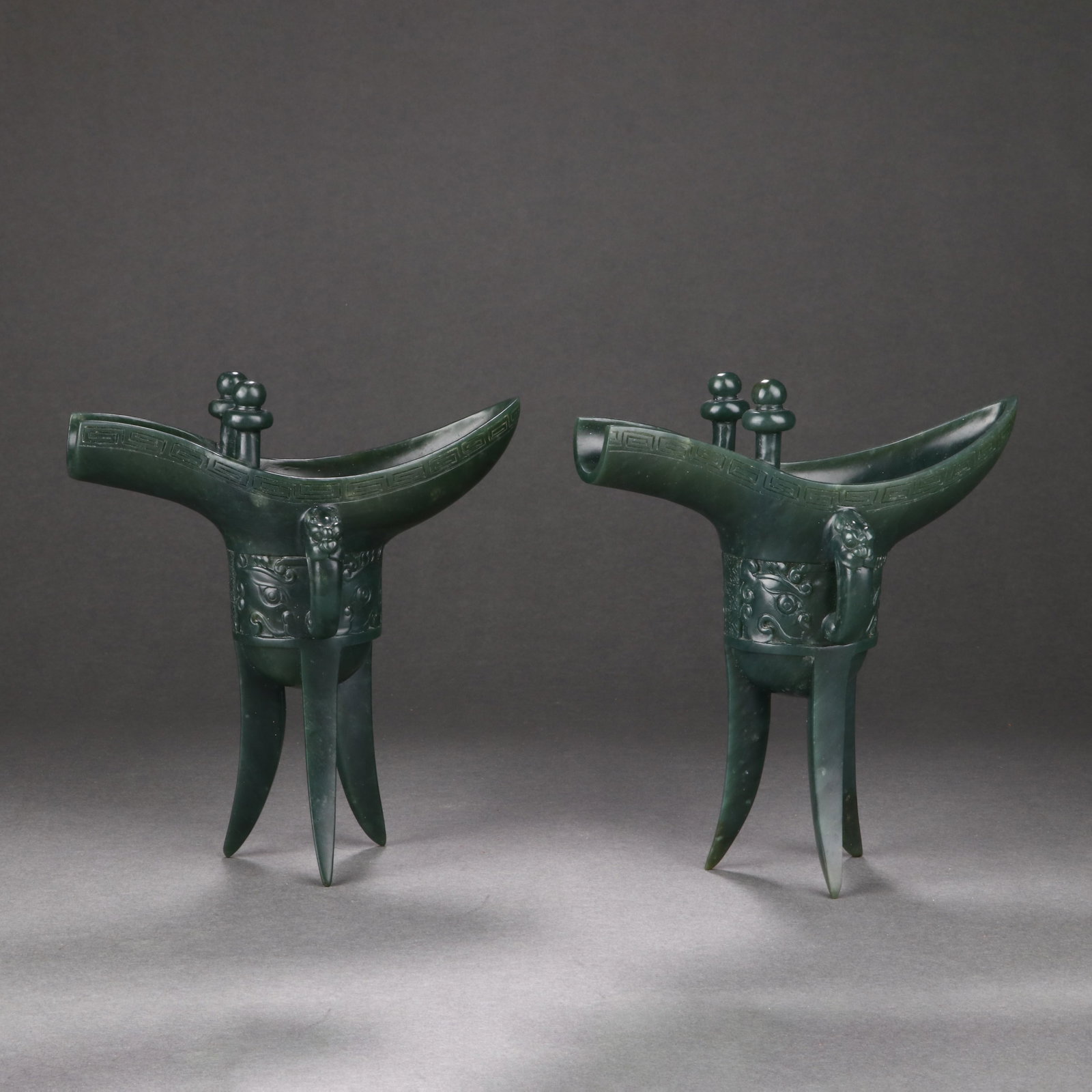 Pair Of Spinach Green Jade Cups: Pair Of Spinach Green Jade Cups. Length:4.92" Width:2.17" Height:5.12"