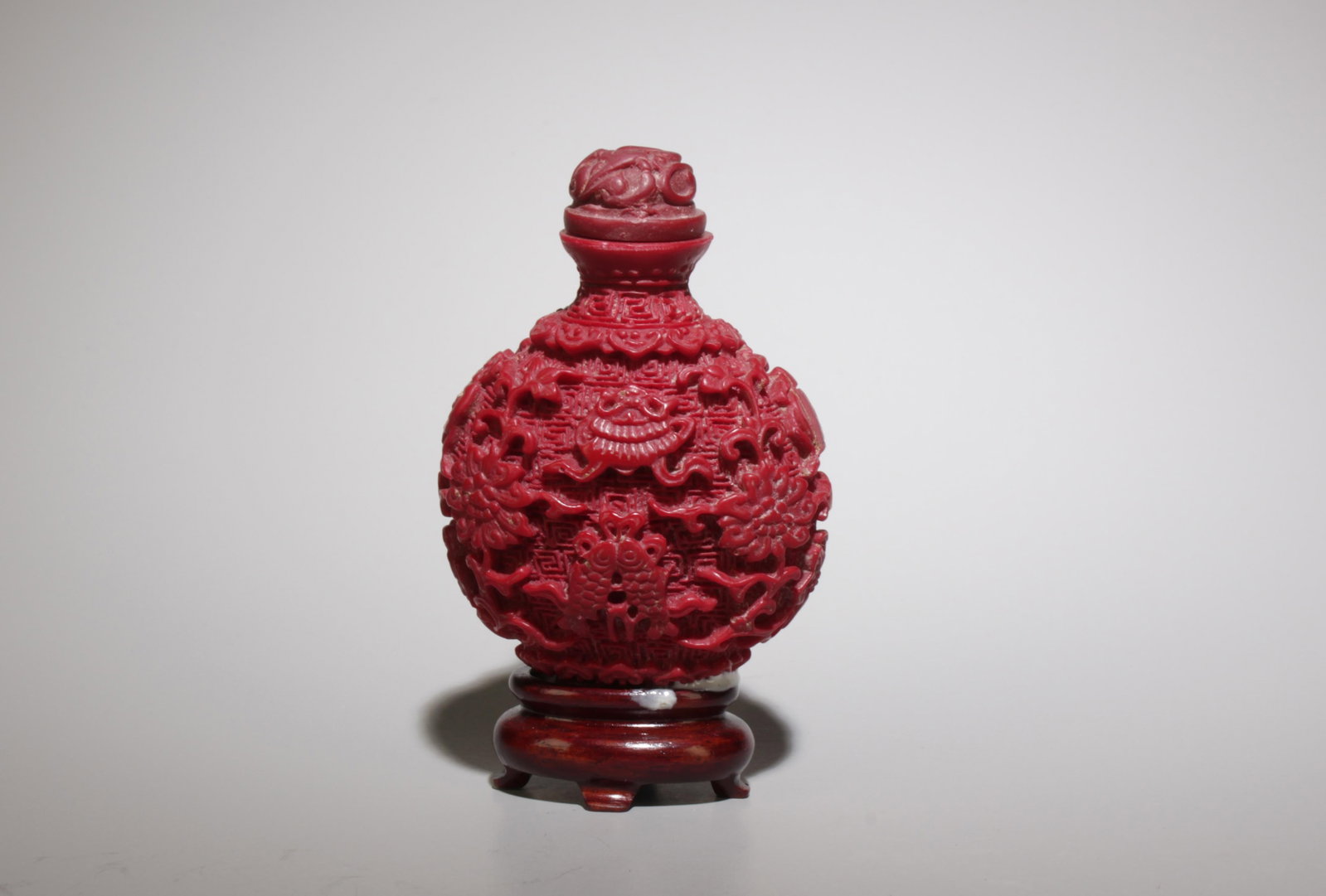 A Cinnabar Snuff Bottle w/ Stand - 2