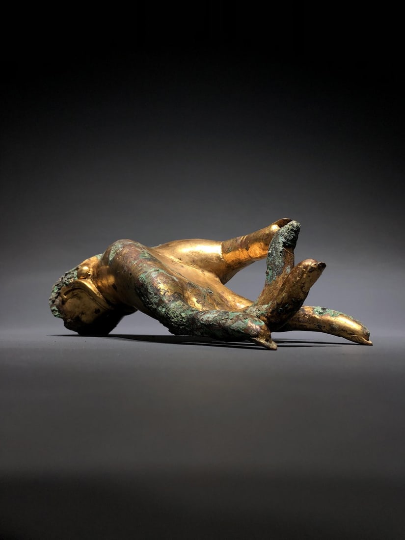 A Bronze Gilt Buddha Hand: A Bronze Gilt Buddha Hand. Dimensions: 7.87in x 3.15in x 2.36in Weight: 4.19lbs.